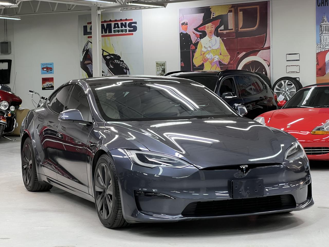 <p>2021 Tesla Model S Plaid AWD | Full Self-Driving | 27,000 km | Tri-Motor</p><p>At Lee Munro&rsquo;s Garage, we focus on the exceptional&mdash;and few cars redefine performance like the Model S Plaid.</p><p>With just 27,000 km, this example delivers Tesla&rsquo;s flagship performance with its tri-motor AWD system producing over 1,000 horsepower, capable of 0&ndash;100 km/h in under 2 seconds. Finished in Deep Blue Metallic over Premium Cream interior, it combines supercar acceleration with everyday usability.</p><p>Key Options & Features:</p><p>Full Self-Driving Capability (FSDC)<br>Premium Interior (PREM3)<br>Deep Blue Metallic (DBMET)<br>Cream Interior (CRM)<br>Factory Wheel Package (OPTWL1)<br>Glass roof & minimalist interior design<br>Massive touchscreen with over-the-air updates<br>All-Wheel Drive (Tri-Motor Plaid)</p><p>This is a clean, well-kept example with low kilometers, offering the latest in Tesla technology and performance in one of the quickest production cars ever built.</p><p>At Lee Munro&rsquo;s Garage, we prioritize quality over volume.<br>Every vehicle is fully inspected, certified, and road-tested before sale.</p><p>We don&rsquo;t offer traditional test drives.<br>We test them so you don&rsquo;t have to.</p><p>Take delivery and experience the car on your own roads.<br>If it&rsquo;s not the right fit, your money back is guaranteed.</p><p>A rare opportunity to own a Plaid-level Tesla without the wait&mdash;ready to be enjoyed immediately.</p>