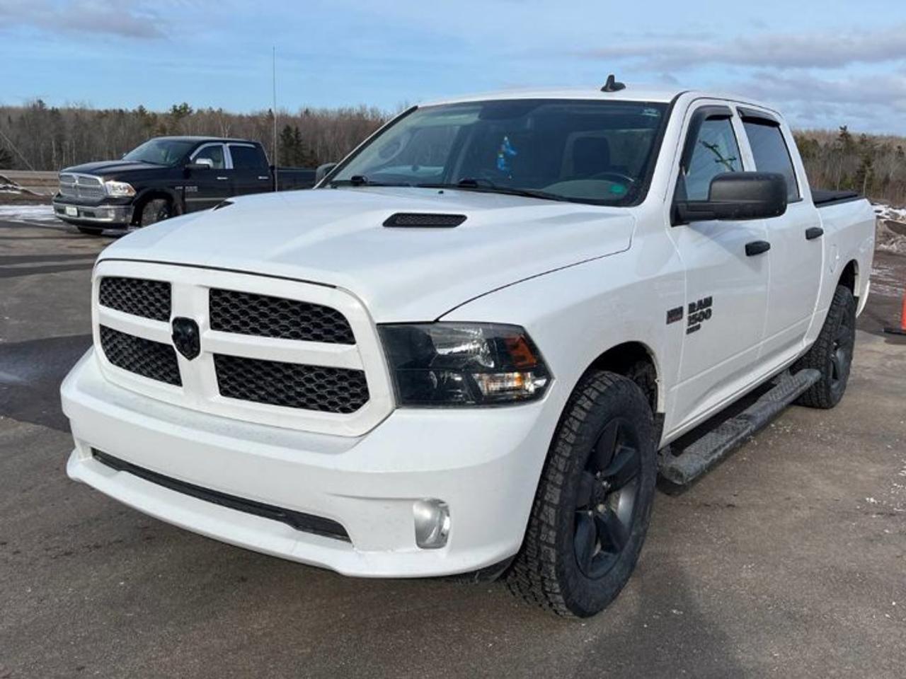 Come see this certified 2019 Ram 1500 Classic Express Crew 4X4 | Hemi | Blackout Pkg | Heated Wheel + Seats | Remote Start | Power Seat and More !. Its Automatic transmission and 5.7 L engine will keep you going. This Ram 1500 Classic has the following options: Reverse Camera, Remote Start, Heated Steering Wheel, Air Conditioning, Heated Seats, Tilt Steering Wheel, Steering Radio Controls, Power Windows, Power Locks, and Traction Control. See it for yourself at Mark Wilsons Better Used Cars, 5055 Whitelaw Road, Guelph, ON N1H 6J4.MASSIVE SELECTION: 500+ vehicles in ONE LOCATION, all Live Market Priced for the best value!STRAIGHTFORWARD & TRANSPARENT PRICING: Our Advertised Price INCLUDES:Safety Certification! (No separate certification fee upcharge).FREE Carfax History Report!NO upcharge for paying cash!CONFIDENCE & PEACE OF MIND: 30-Day/3,000 km Warranty INCLUDED! Plus a 5-Day Exchange Privilege!*EASY FINANCING: Better-than-bank rates, $0 Down, and 3 Months No Payments available OAC. BAD CREDIT APPROVED HERE!WE BUY CARS: Get Top Dollar for your trade, or sell us your vehicle for CASH even if you dont buy ours!www.shopwilsons.comAn Honest, Transparent Buying Experience. Trusted in business since 1961!(Cash Prices Exclude HST and Licensing Fees only.)