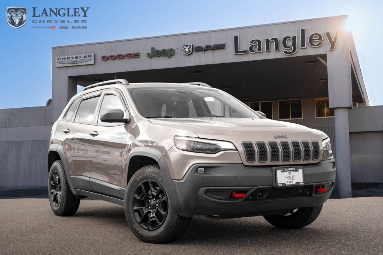 <p><strong>2021 Jeep Cherokee Trailhawk Elite 4x4</strong></p><p>The 2021 Jeep Cherokee Trailhawk Elite combines "Trail Rated" off-road hardware with top-tier luxury features like Nappa leather and ventilated seats.</p><ul><li><p><strong>Engine</strong>: 3.2L Pentastar VVT V6 with Stop/Start (271 hp, 239 lb-ft torque)</p></li><li><p><strong>Drivetrain</strong>: Jeep Active Drive Lock 4x4 with rear locker and Selec-Terrain</p></li><li><p><strong>Efficiency</strong>: 12.9 L/100 km City / 9.7 L/100 km Highway</p></li><li><p><strong>Max Towing</strong>: Up to 2,041 kg (4,500 lbs) with Trailer Tow Group</p></li><li><p><strong>Technology</strong>: 8.4-inch Uconnect 4C NAV and 9-speaker Alpine premium audio</p></li><li><p><strong>Key Features</strong>: Red tow hooks, skid plates, off-road suspension, and hands-free power liftgate</p></li></ul><p>Come book a test drive at Langley Chrysler, conveniently located in Langley, British Columbia.</p>

<p>*All prices plus applicable taxes, applicable environmental recovery charges, documentation of $599 and full tank of fuel surcharge of $76 if a full tank is chosen. <br />Other protection items available that are not included in the above price:<br />Tire & Rim Protection and Key fob insurance starting from $599<br />Service contracts (extended warranties) for coverage up to 7 years and 200,000 kms starting from $599<br />Custom vehicle accessory packages, mudflaps and deflectors, tire and rim packages, lift kits, exhaust kits and tonneau covers, canopies and much more that can be added to your payment at time of purchase<br />Undercoating, rust modules, and full protection packages starting from $199<br />Financing Fee of $500 when applicable<br />Flexible life, disability and critical illness insurances to protect portions of or the entire length of vehicle loan</p>