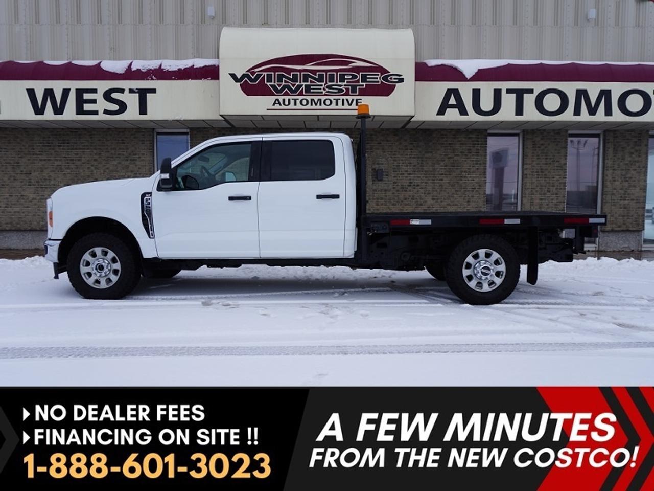 *** Dealer arranged financing on site! Quick, Simple,  no calls or waiting on bank appointments required!! Drive away today ***   NO ADMINISTRATION FEES!!

EQUIPPED WITH ALL THE RIGHT OPTIONS!!!  Does not look like a typical work truck......ALREADY DECKED OUT and ready to get on the job site. 
VERY VERSATILE MULTI-USE TRUCK! This 2023 Ford F-350 Super Duty XLT is a serious heavy-duty truck equipped with the Godzilla 7.3L V8 gas engine, a flat deck setup that makes it a highly sought-after. 

GREAT VALUE WITH Excellent history! This flat deck Super Duty is built for hauling equipment, materials, and getting real jobs done. Skip the cost and wait time of buying new and installing a deck yourself and take advantage of a truck that is already properly configured. With the Crew Cab layout and heavy-duty capability, it is a setup that works just as well on the job site as it does for everyday use! 

Features and Key Highlights:
- Godzilla 7.3L V8 gas engine
- 10 Speed Automatic Transmission
- Locking rear diff 
- 6-Passenger seating (with large fold down center console)
- Touchscreen infotainment system
- Apple car play / Android auto
- Bluetooth connectivity  
- Remote and Keyless entry 
- Factory Remote Start
- Large towing mirrors for improved visibility
- Fog lights 
- Tow hooks
- XLT Premium package (Chrome bumper & Grill, fog lights, power seat, premium big screen stereo and more)
- Power Windows and Locks
- Heavy Duty flat-deck 
- Trailer Towing Package
- Ventures Flat deck

Comes with a Manitoba Safety Certification, and we have many Extended Powertrain warranties available on your vehicle purchase up to 10-year coverage (on eligible vehicles see dealer for details). Financing on site with Zero down financing OAC. Trades accepted. View at Winnipeg West Automotive Group, 5195 Portage Ave. (only a couple of minutes past the new Costco) Dealer permit # 6007, Call now 1(888) 601-3023. This Car is located in Winnipeg Manitoba,  however we can have it shipped anywhere in North America relatively inexpensively.