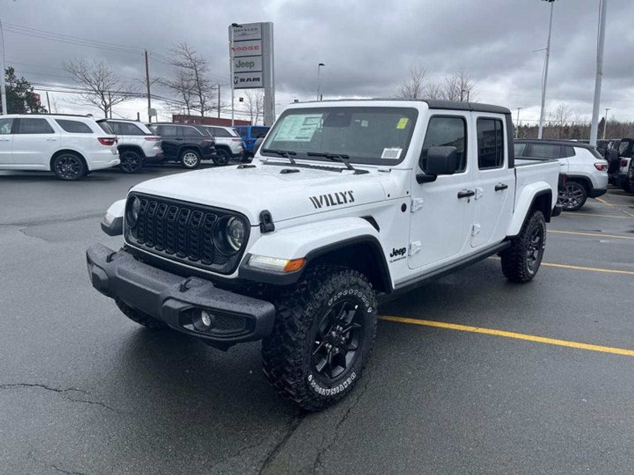 Built for drivers who want open-air freedom and real truck utility, the brand new 2026 Jeep Gladiator Willys brings rugged Jeep character to every road and trail. Finished in White with a Black interior, this four-door pickup combines proven 4x4 capability, a 3.6-litre Pentastar V-6 engine, and automatic transmission for confident driving in Halifax.At Steele Halifax Chrysler Dodge Jeep Ram FIAT, this 2026 Jeep Gladiator Willys stands out with a focused list of practical features that matter every day. You get four-wheel drive for added traction, a trailer hitch for work or recreation, a heated steering wheel for cold mornings, and a rear window defroster for clearer visibility in winter conditions.FEATURES OF THE Gladiator WillysDistinct Willys styling with off-road attitudeJeep truck design with removable freedomFour-door layout adds daily practicalityBuilt for trails, weather, and workTRUCK FEATURESTrailer hitch included for towing conveniencePickup bed adds useful cargo flexibilityFour-door cabin supports crew comfortFour-wheel drive helps in rough terrainADVANCED SAFETY FEATURESRear window defroster aids winter visibilityFour-wheel drive boosts traction controlSolid truck design supports confident drivingHigh ride height improves road awarenessPERFORMANCE AND EFFICIENCY3.6-litre V-6 delivers proven powerAutomatic transmission supports smooth operationGas engine offers familiar refuelling easeFour-wheel drive enhances all-surface capabilityCOMFORT AND CONVENIENCEHeated steering wheel warms cold startsFour doors improve passenger accessSpacious cabin supports everyday usabilityPractical layout suits work and travelTECHNONOLGY AND CONNECTIVITYClear driver-focused controls aid operationAutomatic transmission simplifies daily drivingFunctional cabin layout keeps essentials closeModern Jeep design supports easy useCARGO SPACEPickup bed handles gear and suppliesRear cabin adds extra storage flexibilityTruck design suits workday haulingUseful cargo area for weekend plansWHAT OTHER OWNERS LIKEStrong V-6 power for daily drivingTrue Jeep off-road capability and confidencePickup versatility for work and playOpen-air truck character owners appreciateThe 2026 Jeep Gladiator Willys is a smart fit for drivers who want one vehicle that can handle commuting, outdoor fun, and demanding weather. Its proven V-6 power, automatic transmission, and four-wheel drive setup make it easy to enjoy in every season while keeping the rugged utility expected from a Jeep truck.This 2026 Jeep Gladiator Willys is ready for Halifax drivers who value capability, simplicity, and authentic Jeep design. From towing support with the trailer hitch to added comfort from the heated steering wheel, this brand new pickup delivers the essentials with confidence and purpose.This 2026 Jeep Gladiator Willyss VIN is: 1C6PJTAG1TL176770.We invite you to book a viewing and test drive at your earliest convenience