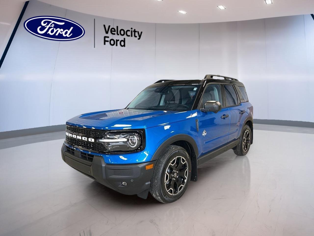 Meet the brand new 2026 Ford Bronco Sport Outer Banks 4x4 at Velocity Ford in Moose Jaw. Finished in Blue with a Black interior, this compact SUV blends everyday comfort with true utility. Its 1.5-litre unleaded engine and 8-speed automatic transmission deliver smooth power for city streets and changing prairie roads.

With four doors, four-wheel drive, and a smart list of must-have features, this new 2026 Ford Bronco Sport Outer Banks 4x4 is ready for work, weekends, and daily life. It offers easy access, confident road manners, and practical technology that helps make each drive simple and enjoyable.

FEATURES OF THE Bronco Sport Outer Banks 4x4

»» Blue exterior with bold SUV presence
»» Four doors for easy passenger access
»» 1.5-litre unleaded engine with automatic
»» Four-wheel drive for added traction

ADVANCED SAFETY FEATURES

»» Anti-Lock Braking System for controlled stops
»» Stability control helps maintain vehicle balance
»» Backup camera supports easier reversing views
»» Blind spot monitor adds lane awareness

The 2026 Ford Bronco Sport Outer Banks 4x4 gives you added peace of mind with key driver-assist and protection features. Lane departure warning, child safety locks, head side airbags, side impact airbags, driver airbag, passenger airbag, and a passenger airbag sensor all help support safer travel.

PERFORMANCE AND EFFICIENCY

»» 1.5-litre engine balances power and economy
»» Eight-speed automatic supports smooth shifting
»» Four-wheel drive boosts year-round confidence
»» Power steering helps easy daily handling

This new 2026 Ford Bronco Sport Outer Banks 4x4 is built for Canadian driving needs. The automatic transmission works smoothly in traffic and on open highways, while cruise control helps reduce fatigue on longer trips. Its compact SUV size also makes parking and manoeuvring easier in town.

COMFORT AND CONVENIENCE

»» Heated front seats add cold-weather comfort
»» Dual-zone climate control helps everyone relax
»» Remote starter warms cabin before driving
»» Push button start adds daily ease

Inside, the 2026 Ford Bronco Sport Outer Banks 4x4 is set up for comfort and convenience. You get front air conditioning, automatic climate control, an adjustable steering wheel, drivers seat lumbar support, memory seats, a power drivers seat, and a power passenger seat for a tailored driving experience.

TECHNONOLGY AND CONNECTIVITY

»» Bluetooth integration supports hands-free communication
»» WiFi hotspot keeps devices connected
»» Satellite radio expands entertainment choices
»» Steering wheel audio controls simplify use

This 2026 Ford Bronco Sport Outer Banks 4x4 also includes practical tech for everyday driving. Automatic headlights, LED headlamps, an auto-dimming rearview mirror, and illuminated driver and passenger vanity mirrors help improve ease of use in changing light and weather conditions.

CARGO SPACE

»» Rear trunk access for simple loading
»» Four-door layout supports passenger flexibility
»» Power windows add everyday convenience
»» Cabin storage suits daily essentials

The 2026 Ford Bronco Sport Outer Banks 4x4 offers useful room for errands, travel bags, and routine gear. Its SUV design makes loading simple, while the rear cargo area and flexible cabin help support busy family use, commuting, and weekend plans around Moose Jaw and beyond.

WHAT OTHER OWNERS LIKE

»» Easy-to-use controls and clear technology
»» Confident all-weather traction from four-wheel drive
»» Comfortable heated seats for winter mornings
»» Helpful safety features for daily driving

This 2026 Ford Bronco Sport Outer Banks 4x4s VIN is: 3FMCR9CN5TRE36275.