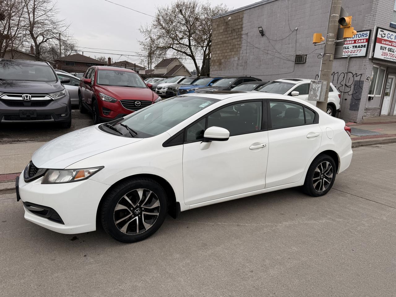 2014 Honda Civic 4dr CVT EX Photo