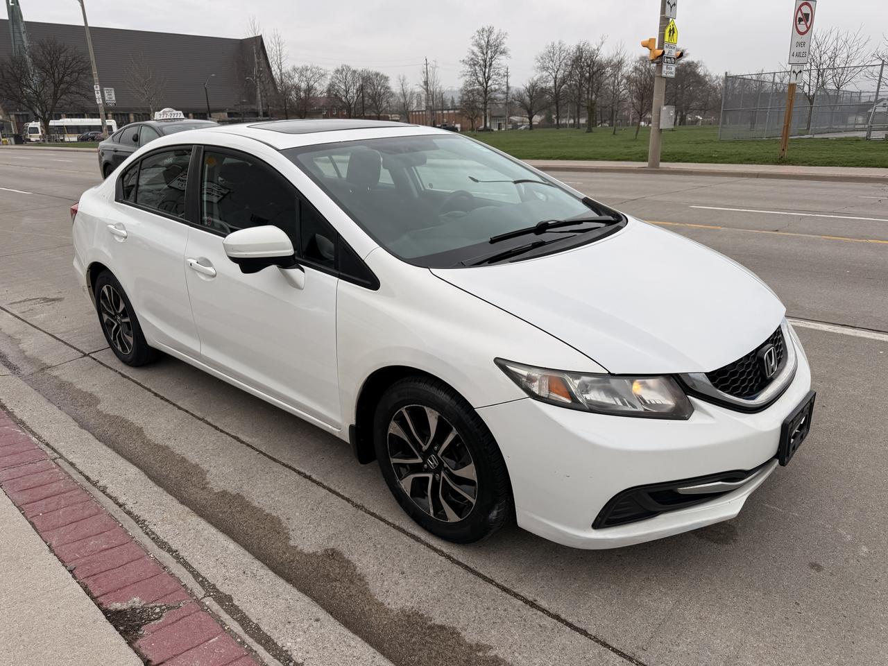 2014 Honda Civic 4dr CVT EX Photo