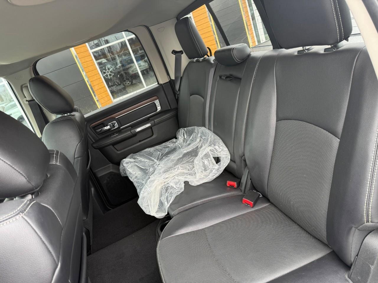 2017 RAM 1500 4WD Crew Cab 140.5  Laramie Photo