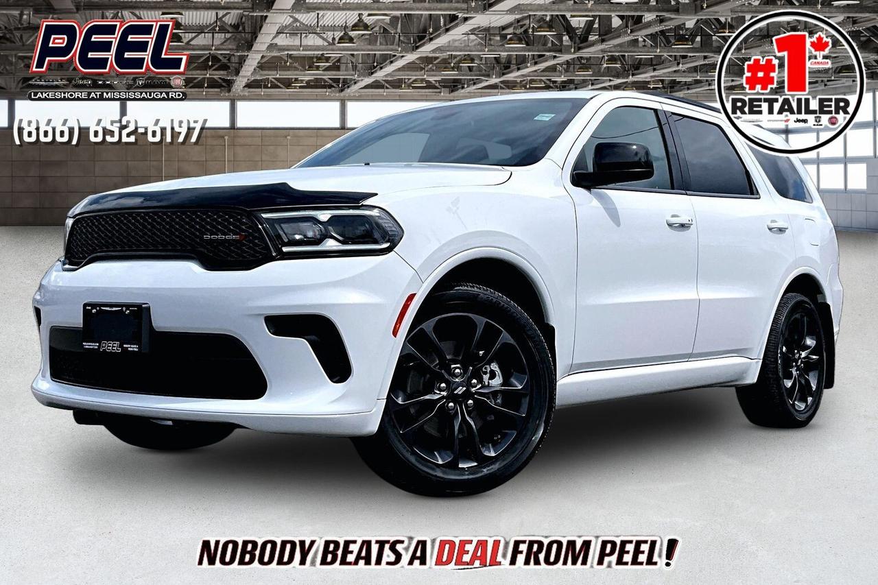 COME SEE WHY NOBODY BEATS A DEAL FROM PEEL! Your Source for ALL make and models used cars and trucks. The True #1 Stellantis Retailer in Ontario for 14 years and running!! (*)

2024 Dodge Durango SXT AWD | 3.6L V6 | White Knuckle | SXT Blacktop Group | 7 Passenger Seating | Heated Cloth Bucket Seats | Uconnect 8.4" Touchscreen Display | Heated Steering Wheel | Apple CarPlay & Android Auto | Trailer Tow Group IV | Class IV Hitch Receiver | Trailer Brake Control | 20x8 Black Noise Aluminum Wheels | Rear Load Levelling Suspension

One Owner

A clean, aggressive three-row SUV with real towing capability, this 2024 Dodge Durango SXT AWD in White Knuckle with the Blacktop Group delivers the look and presence buyers want, powered by the proven 3.6L Pentastar V6 producing 295 hp and 260 lb-ft of torque for smooth acceleration and confident highway driving. Inside, it is set up for everyday family use with 7-passenger seating, heated cloth bucket seats, a heated steering wheel, and the Uconnect 8.4 touchscreen with Apple CarPlay and Android Auto, keeping things simple, comfortable, and connected. Where this Durango really stands out is capability, equipped with the Trailer Tow Group IV, Class IV hitch receiver, trailer brake control, and rear load levelling suspension, allowing for towing up to 6,200 lb when properly equipped, making it ideal for boats, campers, or weekend toys. Finished with 20-inch Black Noise aluminum wheels and the full Blacktop look, it carries a sharp, sporty presence without stepping into V8 territory, and with One Owner history, this is a practical, well-equipped AWD SUV that delivers space, capability, and strong value.
______________________________________________________

Engage & Explore with Peel Chrysler: Whether youre inquiring about our latest offers or seeking guidance, 1-866-652-6197 connects you directly. Dive deeper online or connect with our team to navigate your automotive journey seamlessly.

WE TAKE ALL TRADES & CREDIT. WE SHIP ANYWHERE IN CANADA! OUR TEAM IS READY TO SERVE YOU 7 DAYS!
______________________________________________________
Our advertised prices are for consumers (i.e end users) only. 

*FREE CarFax (click the link above to check it out at no cost to you!)*

*FULLY CERTIFIED! (Have you seen some of these other dealers stating in their advertisements that certification is an additional fee? NOT HERE! Our certification is already included in our low sale prices to save you more!)

(*) Based on the Eastern Business Center National Ranking reported sales to actual customers, not including demonstrators.
______________________________________________________

Peel Chrysler  A Trusted Destination: Based in Port Credit, Ontario, we proudly serve customers from all corners of Ontario and Canada including Toronto, Oakville, North York, Richmond Hill, Ajax, Hamilton, Niagara Falls, Brampton, Thornhill, Scarborough, Vaughan, London, Windsor, Cambridge, Kitchener, Waterloo, Brantford, Sarnia, Pickering, Huntsville, Milton, Woodbridge, Maple, Aurora, Newmarket, Orangeville, Georgetown, Stouffville, Markham, North Bay, Sudbury, Barrie, Sault Ste. Marie, Parry Sound, Bracebridge, Gravenhurst, Oshawa, Ajax, Kingston, Innisfil and surrounding areas. On our website www.peelchrysler.com, you will find a vast selection of new vehicles including the new and used Ram 1500, 2500 and 3500. Chrysler Grand Caravan, Chrysler Pacifica, Jeep Cherokee, Wrangler and more. All vehicles are priced to sell. We deliver throughout Canada. website or call us 1-866-652-6197. 

Disclaimer Statement: At Peel Chrysler, your satisfaction is our priority. While many pre-owned vehicles originally come with two keys, variations may occur based on trade-ins, and all Peel Chrysler Pre-Owned Vehicles come standard with one key. Any extras provided by the previous owner will be included with your purchase, and additional keys can be bought at the time of sale. Online prices and payments are for finance purchases. Used vehicles that are being financed are subject to a $499 (^$1500 non-prime) financing fee, while cash purchases (certified cheque, bank draft, or wire transfer) on used vehicles have a $2,000 surcharge ( online price + $2,000). Cash purchases of new vehicles only incur applicable taxes and licensing fees, and those priced above $100,000 (including accessories or add-ons) are subject to a federal luxury tax. Optional finance and lease terms are available, and if trading in a vehicle with an outstanding loan balance requiring Peel Chrysler to facilitate the lien payout, a Lien Payout Fee of $349 applies. Prices, rates, and payments are subject to change without notice. While we strive for accuracy, occasional technical or human errors may occur, so we encourage verifying all vehicle details, including features, options, materials, and specifications, with a Peel Chrysler representative by contacting us or visiting our dealership. Experience seamless convenience with our nationwide delivery options. Visit our website or contact us for more details.