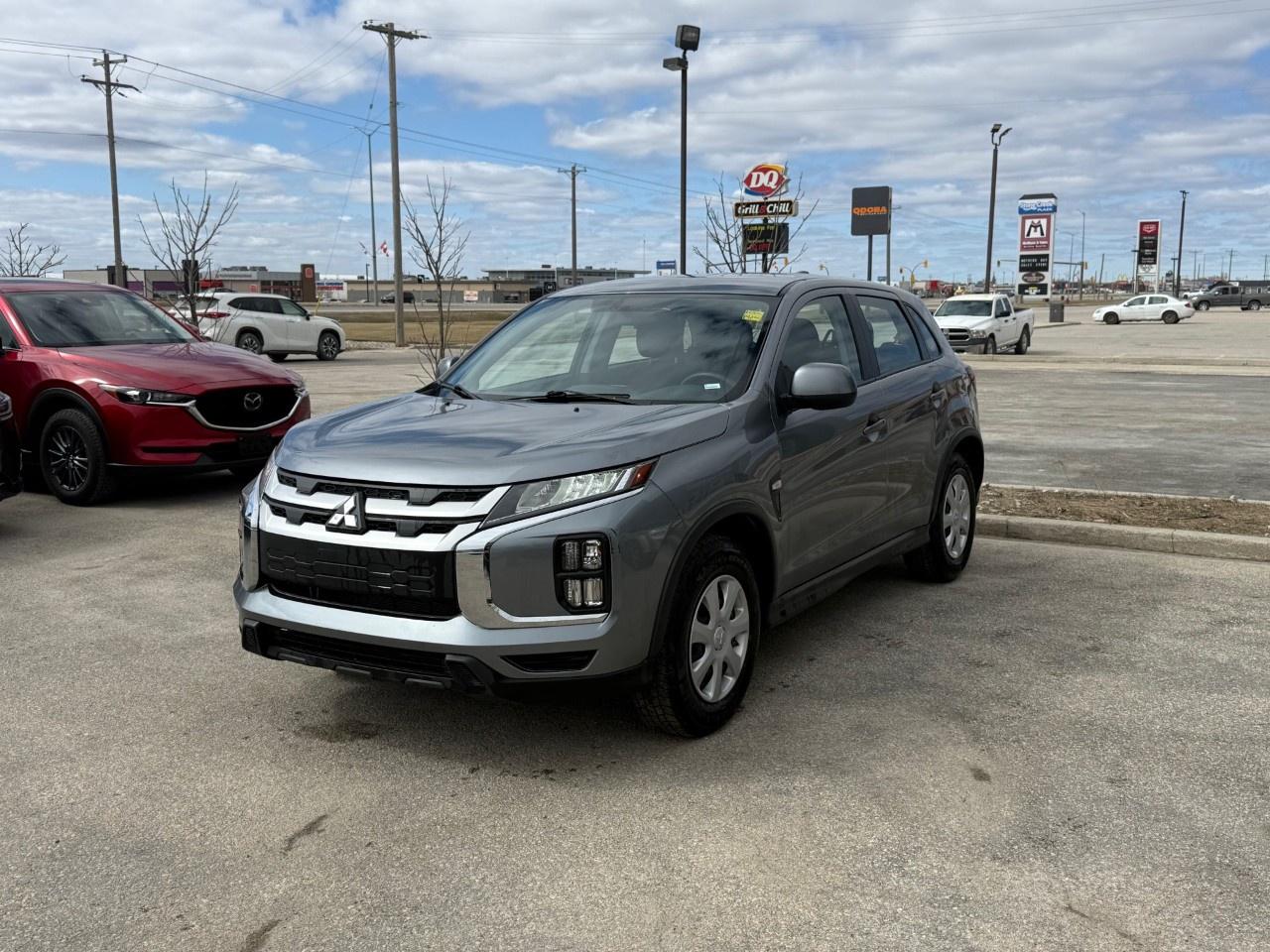 This 2024 Mitsubishi RVR ES AWC offers incredible value and confident all-weather capability, utilizing a reliable 148-horsepower 2.0L 4-cylinder engine paired with a smooth CVT. The practical cabin delivers exceptional everyday convenience with standard heated front seats, an 8-inch smartphone link display with Apple CarPlay and Android Auto, and Mitsubishi's impressive 10-year powertrain warranty for ultimate peace of mind. Come by Highway Mazda today!