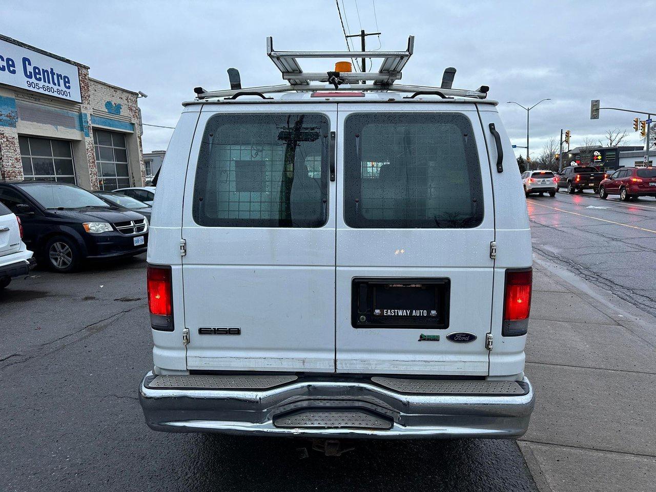 2010 Ford Econoline Cargo Van E 150 Photo