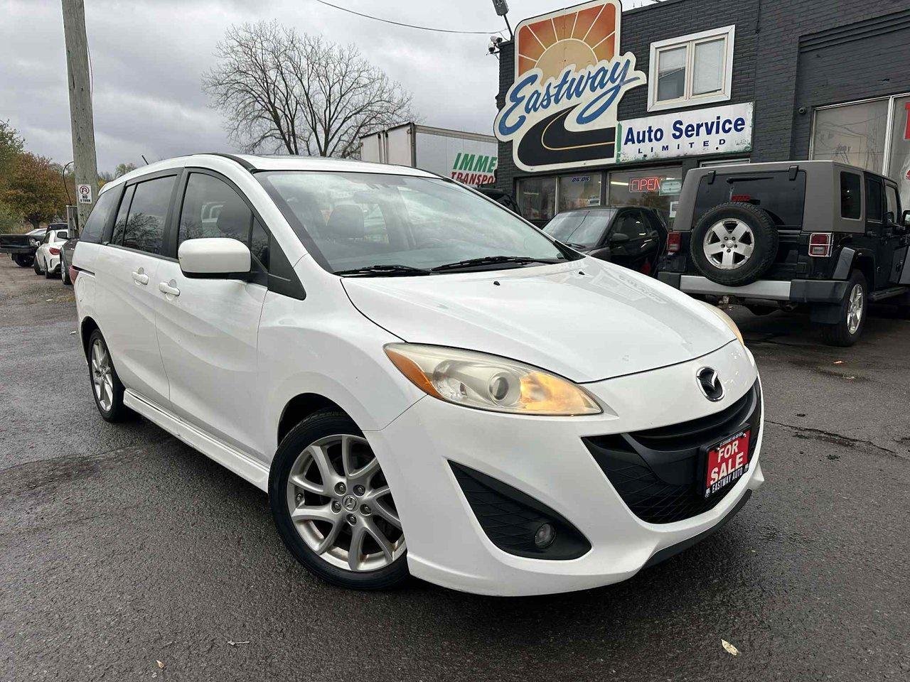 <p style=-webkit-text-stroke-width:0px;background-color:rgb(255, 255, 255);border:0px;box-sizing:border-box;color:rgb(62, 65, 83);font-family:__larsseitFonts_5577c2, __larsseitFonts_Fallback_5577c2;font-feature-settings:inherit;font-kerning:inherit;font-optical-sizing:inherit;font-size-adjust:inherit;font-size:16px;font-stretch:inherit;font-style:normal;font-variant-alternates:inherit;font-variant-caps:normal;font-variant-east-asian:inherit;font-variant-emoji:inherit;font-variant-ligatures:normal;font-variant-numeric:inherit;font-variant-position:inherit;font-variation-settings:inherit;font-weight:400;letter-spacing:normal;line-height:2.4rem;margin:1em 0px;orphans:2;padding:0px;text-align:start;text-decoration-color:initial;text-decoration-style:initial;text-decoration-thickness:initial;text-indent:0px;text-transform:none;white-space:pre-line;widows:2;word-spacing:0px;>PLEASE LET US KNOW IF YOU WOULD LIKE TO SEE VEHICLE. OPERATING BY APPOINTMENT ONLY</p><p style=-webkit-text-stroke-width:0px;background-color:rgb(255, 255, 255);border:0px;box-sizing:border-box;color:rgb(62, 65, 83);font-family:__larsseitFonts_5577c2, __larsseitFonts_Fallback_5577c2;font-feature-settings:inherit;font-kerning:inherit;font-optical-sizing:inherit;font-size-adjust:inherit;font-size:16px;font-stretch:inherit;font-style:normal;font-variant-alternates:inherit;font-variant-caps:normal;font-variant-east-asian:inherit;font-variant-emoji:inherit;font-variant-ligatures:normal;font-variant-numeric:inherit;font-variant-position:inherit;font-variation-settings:inherit;font-weight:400;letter-spacing:normal;line-height:2.4rem;margin:1em 0px;orphans:2;padding:0px;text-align:start;text-decoration-color:initial;text-decoration-style:initial;text-decoration-thickness:initial;text-indent:0px;text-transform:none;white-space:pre-line;widows:2;word-spacing:0px;>FINANCING AVAILABLE! ALL CREDIT TYPES APPROVED. INQUIRE WITHIN. Eastway Auto Service Ltd is a family owned dealership and service centre serving the Niagara Region since 1990! Proud members of both OMVIC and the UCDA-</p><p style=-webkit-text-stroke-width:0px;background-color:rgb(255, 255, 255);border:0px;box-sizing:border-box;color:rgb(62, 65, 83);font-family:__larsseitFonts_5577c2, __larsseitFonts_Fallback_5577c2;font-feature-settings:inherit;font-kerning:inherit;font-optical-sizing:inherit;font-size-adjust:inherit;font-size:16px;font-stretch:inherit;font-style:normal;font-variant-alternates:inherit;font-variant-caps:normal;font-variant-east-asian:inherit;font-variant-emoji:inherit;font-variant-ligatures:normal;font-variant-numeric:inherit;font-variant-position:inherit;font-variation-settings:inherit;font-weight:400;letter-spacing:normal;line-height:2.4rem;margin:1em 0px;orphans:2;padding:0px;text-align:start;text-decoration-color:initial;text-decoration-style:initial;text-decoration-thickness:initial;text-indent:0px;text-transform:none;white-space:pre-line;widows:2;word-spacing:0px;><strong data-start=67 data-end=85>2012 Mazda5 GS for sale at Eastway Auto Service Ltd. 231,000 km.</strong><br>This versatile and stylish 2012 Mazda5 GS offers the perfect blend of practicality and sporty design. Powered by a reliable 2.5L 4-cylinder engine and paired with an automatic transmission, it delivers smooth performance and great fuel efficiency. The Mazda5 features seating for six with easy-access sliding rear doors, making it ideal for families or anyone needing extra space without the bulk of a minivan. Equipped with air conditioning, power windows and locks, keyless entry, cruise control, Bluetooth, and steering-wheel audio controls, it provides comfort and convenience for every drive.</p><p style=-webkit-text-stroke-width:0px;background-color:rgb(255, 255, 255);border:0px;box-sizing:border-box;color:rgb(62, 65, 83);font-family:__larsseitFonts_5577c2, __larsseitFonts_Fallback_5577c2;font-feature-settings:inherit;font-kerning:inherit;font-optical-sizing:inherit;font-size-adjust:inherit;font-size:16px;font-stretch:inherit;font-style:normal;font-variant-alternates:inherit;font-variant-caps:normal;font-variant-east-asian:inherit;font-variant-emoji:inherit;font-variant-ligatures:normal;font-variant-numeric:inherit;font-variant-position:inherit;font-variation-settings:inherit;font-weight:400;letter-spacing:normal;line-height:2.4rem;margin:1em 0px;orphans:2;padding:0px;text-align:start;text-decoration-color:initial;text-decoration-style:initial;text-decoration-thickness:initial;text-indent:0px;text-transform:none;white-space:pre-line;widows:2;word-spacing:0px;>Priced at $6,995 plus tax and licensing . Safety included in purchase price!</p><p style=-webkit-text-stroke-width:0px;background-color:rgb(255, 255, 255);border:0px;box-sizing:border-box;color:rgb(62, 65, 83);font-family:__larsseitFonts_5577c2, __larsseitFonts_Fallback_5577c2;font-feature-settings:inherit;font-kerning:inherit;font-optical-sizing:inherit;font-size-adjust:inherit;font-size:16px;font-stretch:inherit;font-style:normal;font-variant-alternates:inherit;font-variant-caps:normal;font-variant-east-asian:inherit;font-variant-emoji:inherit;font-variant-ligatures:normal;font-variant-numeric:inherit;font-variant-position:inherit;font-variation-settings:inherit;font-weight:400;letter-spacing:normal;line-height:2.4rem;margin:1em 0px;orphans:2;padding:0px;text-align:start;text-decoration-color:initial;text-decoration-style:initial;text-decoration-thickness:initial;text-indent:0px;text-transform:none;white-space:pre-line;widows:2;word-spacing:0px;>Located at Eastway Auto Service Ltd. 259 Merritt Street, St. Catharines ON L2T 1J7</p><p style=-webkit-text-stroke-width:0px;background-color:rgb(255, 255, 255);border:0px;box-sizing:border-box;color:rgb(62, 65, 83);font-family:__larsseitFonts_5577c2, __larsseitFonts_Fallback_5577c2;font-feature-settings:inherit;font-kerning:inherit;font-optical-sizing:inherit;font-size-adjust:inherit;font-size:16px;font-stretch:inherit;font-style:normal;font-variant-alternates:inherit;font-variant-caps:normal;font-variant-east-asian:inherit;font-variant-emoji:inherit;font-variant-ligatures:normal;font-variant-numeric:inherit;font-variant-position:inherit;font-variation-settings:inherit;font-weight:400;letter-spacing:normal;line-height:2.4rem;margin:1em 0px;orphans:2;padding:0px;text-align:start;text-decoration-color:initial;text-decoration-style:initial;text-decoration-thickness:initial;text-indent:0px;text-transform:none;white-space:pre-line;widows:2;word-spacing:0px;>Call Sam at 905-680-8001 or Text Nahida at 905-932-1420</p>