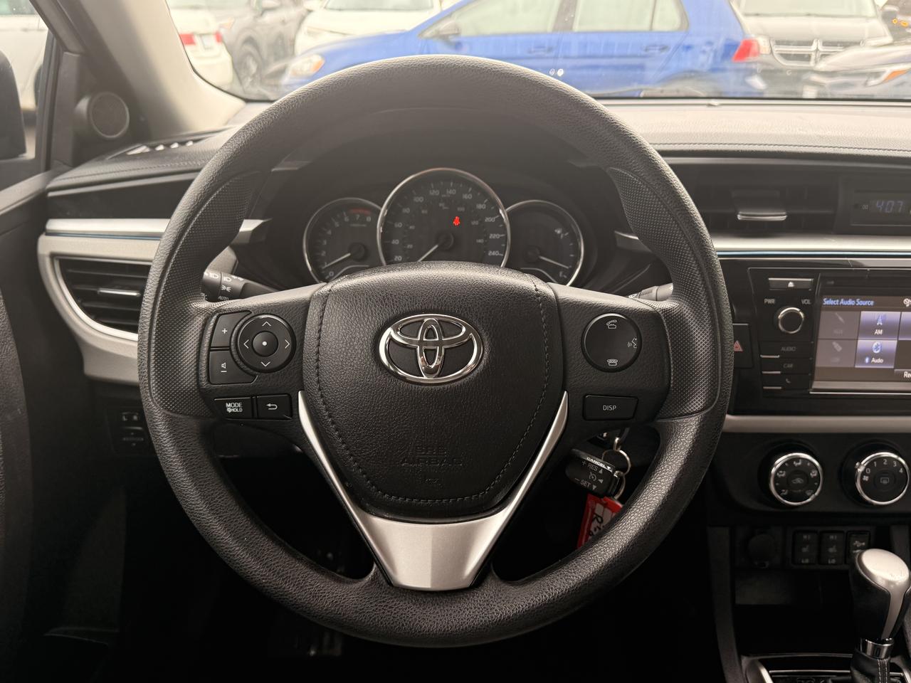 2015 Toyota Corolla 4dr Sdn CVT LE *LOW KM* Photo