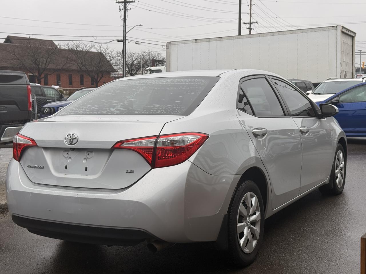 2015 Toyota Corolla 4dr Sdn CVT LE *LOW KM* Photo