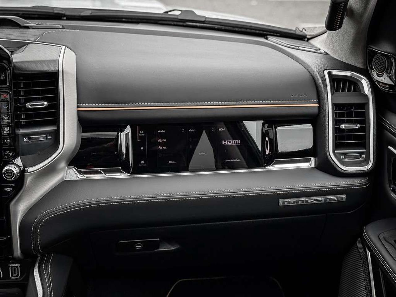 2026 RAM 1500 Tungsten   TOWING TECH GROUP   TOW GROUP   BED UTILITY   TOW MIRRORS   MULTI-FUNCTION TAILGATE Photo