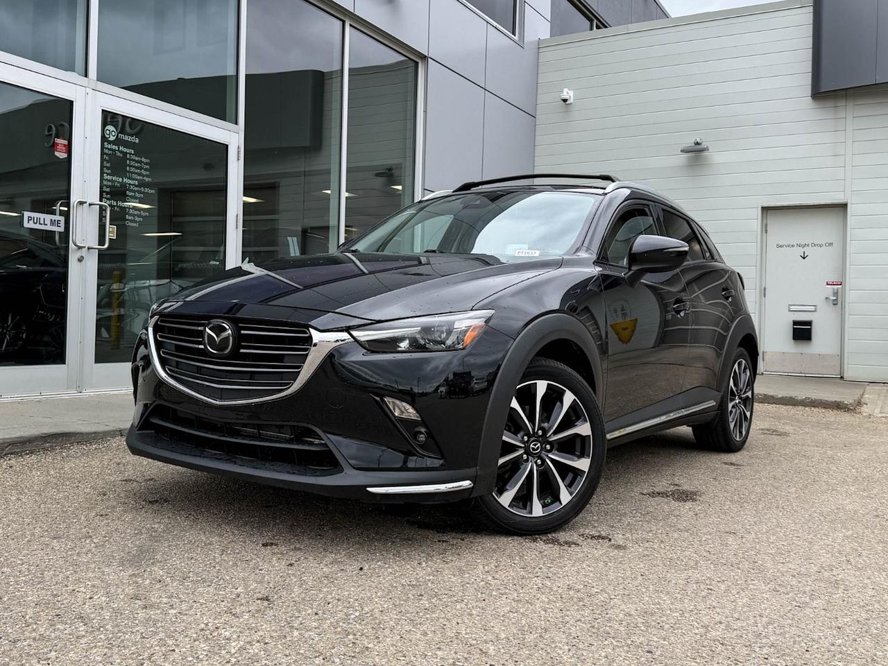 Discover the perfect blend of style, performance, and advanced features with this pre-owned 2019 Mazda CX-3 GT Auto AWD in striking Jet Black Mica. Powered by a 2.0L SKYACTIV-G 4-cylinder engine paired with a smooth 6-speed automatic transmission, this compact SUV delivers responsive handling and efficient all-wheel drive for confident driving in any condition.Step inside to premium leather-trimmed seats with adjustable heated front seats, a heads-up display, and a touchscreen infotainment system with navigation and smartphone integration for seamless connectivity. Safety is top-notch with adaptive cruise control, lane departure warning, blind spot monitoring, and multiple airbags providing peace of mind.Finished with 18 machined alloy wheels, LED headlights, and sleek exterior accents, the CX-3 GT combines sporty looks with practicality. Whether navigating city streets or weekend adventures, this Mazda offers an engaging, comfortable ride loaded with features youll love. Schedule a test drive today and experience why the 2019 CX-3 GT is an outstanding choice!Go Mazda is an AMVIC licensed businessThis vehicle has been registered in the province ofQuébec and is showing a CarFax incident in the amount of $13,816.69