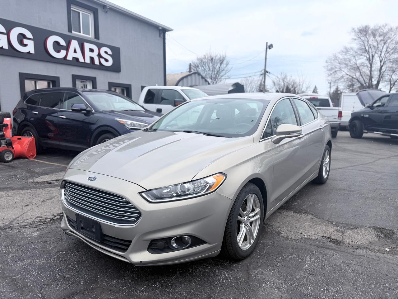 <p class=p1><span class=s1>✅ Certified | </span><strong>2016 Ford Fusion SE | AWD</strong></p><p class=p2>&nbsp;</p><p class=p3>This Certified 2016 Ford Fusion SE AWD is a stylish and comfortable sedan offering confident all-wheel drive performance, smooth handling, and excellent everyday practicality &mdash; perfect for year-round driving.</p><p class=p2>&nbsp;</p><p class=p1><span class=s1>🔹 </span><strong>2.0L 4-Cylinder Engine</strong></p><p class=p3>🔹 Automatic Transmission</p><p class=p1><span class=s1>🔹 </span><strong>All-Wheel Drive (AWD)</strong></p><p class=p1><span class=s1>🔹 </span><strong>SE Trim &mdash; Well Equipped</strong></p><p class=p3>🔹 Backup Camera</p><p class=p3>🔹 Touchscreen Display</p><p class=p3>🔹 Bluetooth &ndash; Hands-Free Calling & Audio Streaming</p><p class=p3>🔹 Heated Front Seats</p><p class=p3>🔹 Power Driver Seat</p><p class=p3>🔹 Keyless Entry</p><p class=p3>🔹 Cruise Control</p><p class=p3>🔹 Steering Wheel Audio & Cruise Controls</p><p class=p3>🔹 Air Conditioning</p><p class=p3>🔹 Power Windows, Locks & Mirrors</p><p class=p3>🔹 Alloy Wheels</p><p class=p3>🔹 Traction Control & ABS</p><p class=p3>🔹 Spacious Trunk</p><p class=p3>🔹 Runs and Drives Excellent</p><p class=p2>&nbsp;</p><p class=p3>📍 Visit Us:</p><p class=p3>74 Parkdale Avenue North, Hamilton, Ontario</p><p class=p2>&nbsp;</p><p class=p3>📞 Call or Text:</p><p class=p3>(905) 975-9705 / (905) 462-5542</p><p class=p2>&nbsp;</p><p class=p3>📧 Email:</p><p class=p3>gusmarkos@gmail.com</p><p class=p2>&nbsp;</p><p class=p3>🗓️ Test Drives by Appointment Only &mdash; Book Yours Today</p><p class=p2>&nbsp;</p><p class=p3>🛡️ Buy With Confidence &mdash; OMVIC Licensed Dealership</p><p class=p3>✔️ CARFAX VERIFIED &mdash; Full History & Lien-Free</p><p class=p3>✔️ No Hidden Fees &mdash; Just Price + HST + Licensing</p><p class=p3>✔️ Trade-Ins Welcome &mdash; Top Dollar for Your Vehicle</p><p class=p3>✔️ Don&rsquo;t See What You Want? We&rsquo;ll Find It for You</p><p class=p2>&nbsp;</p><p class=p3>💻 100% Online Purchase Available &mdash; Financing & Delivery Options</p><p class=p3>🚗 Ontario-Wide Delivery Available</p><p class=p3>✈️ Ask About Our Customer Travel Program</p>