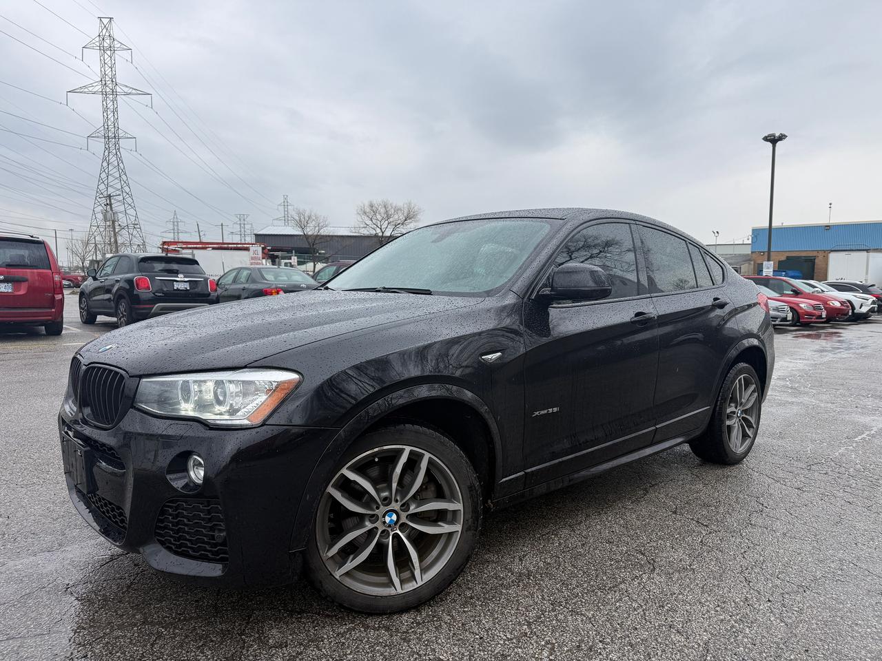 <p>Are you looking for a stylish and sporty SUV that turns heads wherever it goes? Feast your eyes on this stunning 2015 BMW X4 xDrive35i <em>M PACKAGE</em>, available now at Select Auto Centre Ltd.! This sleek black beauty combines the practicality of an SUV with the exhilarating performance youd expect from a BMW. With a sophisticated beige interior, this X4 offers a luxurious driving experience thats sure to impress. This well-maintained vehicle has 165,609km on the odometer.</p><p>This All-Wheel Drive X4 is ready for any road condition, whether youre navigating city streets or exploring the Canadian countryside. Its automatic transmission makes for a smooth and effortless driving experience, while the sporty M PACKAGE enhances the vehicles aggressive stance and performance capabilities. This vehicle is more than just a mode of transportation; its a statement.</p><p>Here are some of the standout features that make this 2015 BMW X4 <em>M PACKAGE</em> a must-see:</p><ul><li><strong>M PACKAGE:</strong> Experience the thrill of BMWs legendary performance and styling enhancements.</li><li><strong>All-Wheel Drive:</strong> Conquer any weather condition with confidence and control.</li><li><strong>Luxurious Interior:</strong> Enjoy the comfort and elegance of a premium beige interior.</li><li><strong>Sporty Silhouette:</strong> Make a bold statement with the X4s distinctive coupe-like roofline.</li><li><strong>BMW Engineering:</strong> Revel in the precision handling and performance that defines the BMW brand.</li><li>$14888 + HST & LIC. CERTIFIED* NO HIDDEN FEES.</li></ul><p><strong><em>Powered by AutoIntelligence&trade;</em></strong> Vehicle information has been generated using artificial intelligence and is provided for informational purposes only. While efforts are made to ensure accuracy, please confirm all details directly with the dealer.</p>