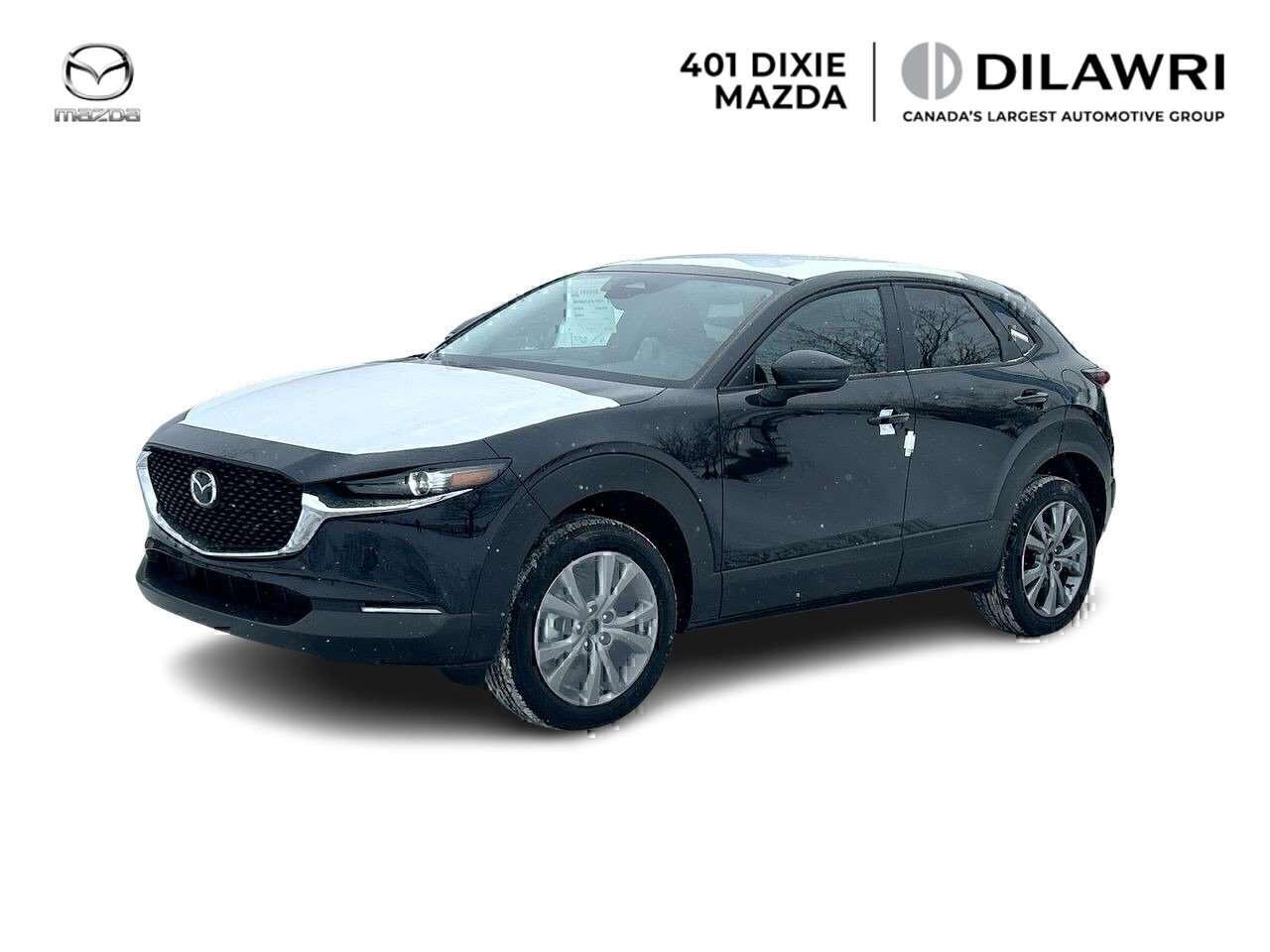 The 2026 Mazda CX-30 GS Kuro stands out with distinctive black exterior accents and unique interior styling. Powered by the 2.5L SKYACTIV-G engine with standard i-Activ AWD, it combines performance with exclusive design elements including leatherette seating and a power glass moonroof. Driver seat memory and advanced driver assistance features add comfort and confidence.