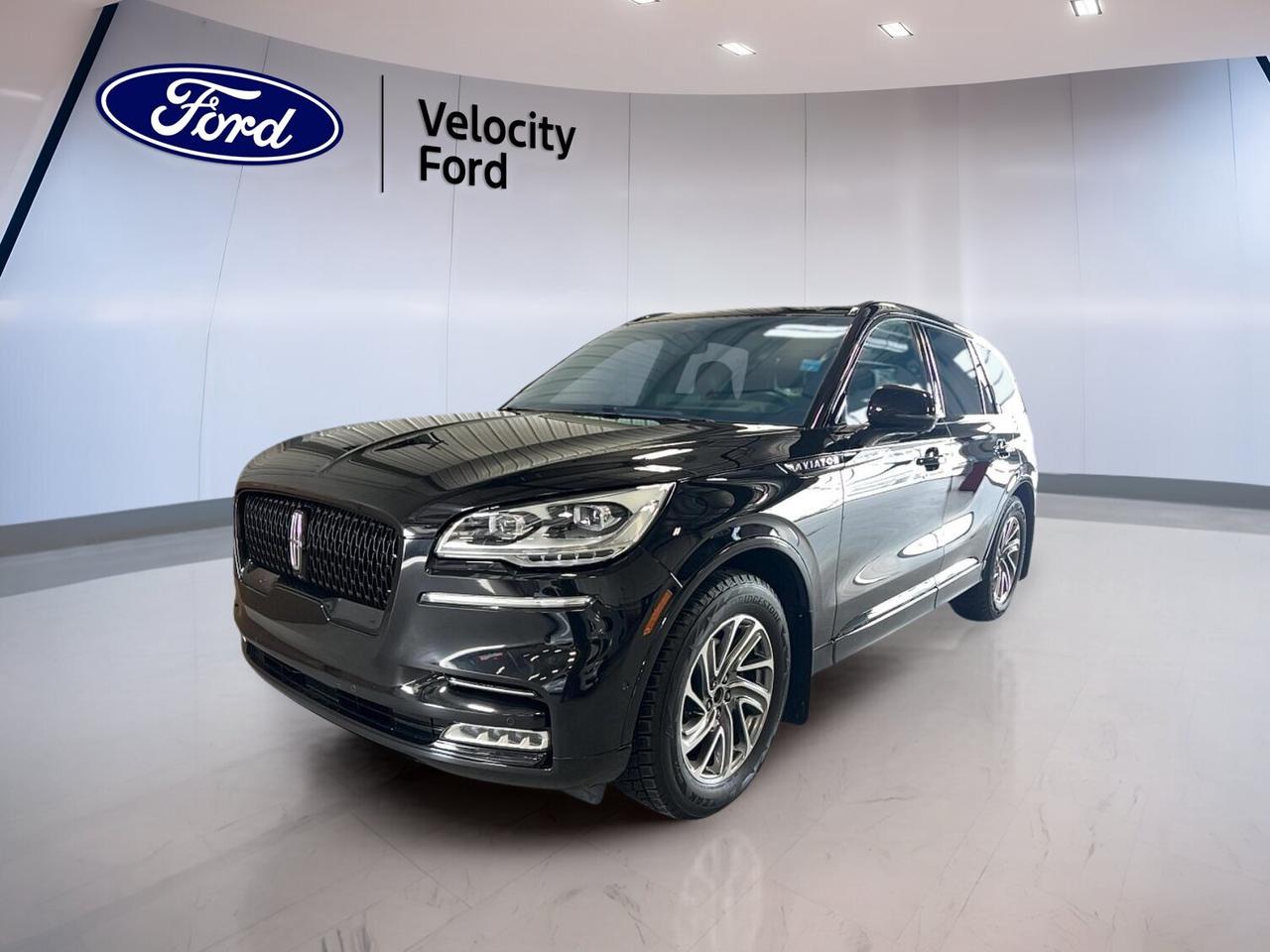 This used 2023 Lincoln Aviator Reserve AWD brings premium comfort, smooth power, and smart utility to every drive in Moose Jaw. Finished in Black with a Black interior, this four-door SUV shows 74,147 km and pairs a 3.0-litre unleaded engine with an automatic transmission for refined everyday performance.

At Velocity Ford, this Lincoln Aviator Reserve AWD stands out with a strong list of desirable features already confirmed on this vehicle. Highlights include a panoramic sunroof, navigation system, backup camera, blind spot monitor, lane departure warning, heated and ventilated seating options, and a power liftgate.

FEATURES OF THE Aviator Reserve AWD 

»» Panoramic sunroof brings in more daylight
»» Navigation helps guide every trip clearly
»» Power liftgate adds daily loading ease
»» Heated and ventilated seating boosts comfort

ADVANCED SAFETY FEATURES

»» Backup camera helps with safer reversing
»» Blind spot monitor supports lane awareness
»» Lane departure warning adds extra confidence
»» Side and head airbags enhance protection

PERFORMANCE AND EFFICIENCY

»» 3.0-litre unleaded engine delivers smooth power
»» Automatic transmission supports relaxed daily driving
»» All-wheel drive adds year-round traction
»» Adjustable suspension helps balance ride comfort

COMFORT AND CONVENIENCE

»» Heated front seats warm cold mornings
»» Heated rear seats add passenger comfort
»» Dual-zone climate control manages cabin temperature
»» Remote starter helps prepare the cabin

TECHNONOLGY AND CONNECTIVITY

»» Bluetooth integration supports hands-free communication
»» Navigation system offers clear route guidance
»» WiFi hotspot keeps devices better connected
»» Satellite radio expands entertainment choices

CARGO SPACE

»» Power liftgate simplifies cargo area access
»» Four-door layout supports easy passenger entry
»» Rear space suits shopping or travel gear
»» Spare tire adds extra road-trip reassurance

AWARDS & RECOGNITIONS

»» Top Safety Pick, Insurance Institute for Highway Safety, 2023

WHAT OTHER OWNERS LIKE

»» Smooth power delivery in daily driving
»» Quiet cabin on longer highway trips
»» Easy-to-use technology and navigation features
»» Comfortable seating for family travel

This 2023 Lincoln Aviator Reserve AWD  is well equipped with cruise control, power steering, anti-lock braking system, stability control, child safety locks, remote trunk release, heated mirrors, power windows, front air conditioning, steering wheel audio controls, memory seats, tinted windows, HD Radio, automatic headlights, rear climate control, rear audio controls, and rear window defroster.

You will also appreciate push-button start, memory mirrors, retractable mirrors, turn signal mirrors, an auto-dimming rearview mirror, driver and passenger lumbar support, drivers side power seat, power passenger seat, tire pressure monitoring, automatic door locks, LED headlamps, and illuminated vanity mirrors. This luxury SUV is built to make daily driving feel easy, capable, and rewarding.

This 2023 Lincoln Aviator Reserve AWD VIN is: 5LM5J7XC1PGL01429.