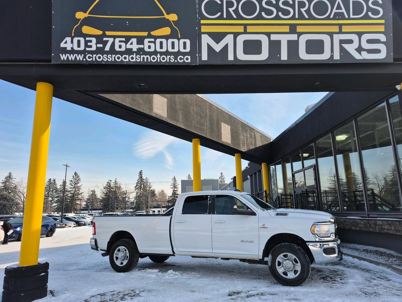 <p>The 2021 Ram 3500 Big Horn 4x4 Crew Cab with an 8 box is a heavy-duty pickup designed for maximum towing and payload, featuring a 6.7L Cummins Diesel. Key features include a 6-speed transmission, 4WD, and an 8-foot bed. It includes backup camera, and trailer hitch.</p><p>Key Specifications & Features</p><p>Engine & Power:6.7L Cummins Turbo Diesel (370 hp, 850 lb.-ft. torque).</p><p>Drivetrain: 4x4 (Four-Wheel Drive) with electronic high/low selector.</p><p>Configuration: Crew Cab with 8-foot box.</p><p>Key Equipment: Power windows/locks, cruise control, and 4-way headrests</p><p style=margin-right: 0px; margin-left: 0px; font-size: 16px; font-family: Times New Roman, serif;><strong><span style=color: rgb(0, 176, 80);>Lien has already been paid off.</span></strong></p><p>✅ Instant Approval: Apply Now at www.crossroadsmotors.ca/forms/finance</p><p>✅ All Credit Accepted &ndash; Specializing in credit rebuild programs!</p><p>✅ Fast Approvals &ndash; Flexible financing options for all credit situations!</p><p>🔧 Mechanical Fitness Assessment Complete &ndash; Ensuring reliability</p><p>🔍 CarFax & Inspection Reports Available &ndash; Full transparency</p><p>📄 Financing & Extended Warranty Options &ndash; Flexible solutions tailored to you</p><p>📍 Visit Us At: 7330 Macleod Trail SE, Calgary, AB T2H 0L9</p><p>📞 Call: 403-764-6000</p><p>AMVIC Licensed Dealer</p><p>Your perfect car is waiting&mdash;contact us now! 🚗</p>