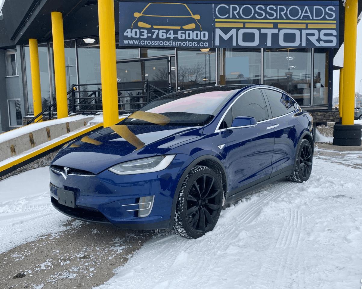 <p>The 2016 Tesla Model X is a luxury electric SUV featuring signature Falcon Wing doors, Offering seating 6, Key features include AWD, Autopilot, and a 17-inch infotainment screen.</p><p>&nbsp;</p><p>Key Features and Specs:</p><p>Performance: All-wheel drive (dual motor) is standard.</p><p>Interior & Technology: Features a 17-inch touchscreen, over-the-air updates, and Falcon Wing rear doors that require minimal side clearance.</p><p>Safety: Equipped with forward collision warning, automatic emergency braking, and a, high-efficiency cabin air filter.</p><p><strong>Contact Us Today to Schedule a Test Drive! 🚗</strong></p><p><strong>🚗&nbsp;CREDIT REBUILDING SPECIALISTS<br>✅&nbsp;Instant Approval: Apply Now at&nbsp;<a href=https://www.crossroadsmotors.ca/forms/finance rel=noopener>www.crossroadsmotors.ca/forms/finance</a><br>✅&nbsp;All Credit Accepted &ndash; Specializing in credit rebuild programs!<br>✅&nbsp;Fast Approvals &ndash; Flexible financing options for all credit situations!</strong></p><p><strong>🔧&nbsp;Mechanical Fitness Assessment Complete &ndash; Ensuring reliability<br>🔍&nbsp;CarFax & Inspection Reports Available &ndash; Full transparency<br>📄&nbsp;Financing & Extended Warranty Options &ndash; Flexible solutions tailored to you</strong></p><p><strong>📍&nbsp;Visit Us At:&nbsp;7330 Macleod Trail SE, Calgary, AB T2H 0L9<br>📞&nbsp;Call:&nbsp;403-764-6000</strong></p><p><strong>AMVIC Licensed Dealer</strong></p><p><strong>Your perfect car is waiting&mdash;contact us now! 🚗✨</strong></p>