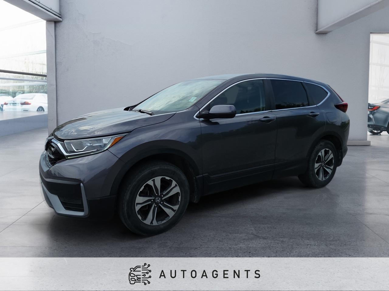 <p> 1.5L Turbocharged 4-Cylinder Engine (190 HP / 179 lb-ft torque) <span data-state=closed></span><br data-start=131 data-end=134> Continuously Variable Transmission (CVT) <span data-state=closed></span><br data-start=214 data-end=217> Real Time AWD with Intelligent Control (if equipped) <span data-state=closed></span><br data-start=309 data-end=312 data-is-only-node=> Eco Assist System & Idle Stop<br data-start=343 data-end=346> 17 Alloy Wheels <span data-state=closed></span><br data-start=402 data-end=405> LED Daytime Running Lights<br data-start=433 data-end=436> Automatic Headlights with High Beam Assist<br data-start=480 data-end=483> Keyless Entry with Push Button Start<br data-start=521 data-end=524> Automatic Climate Control<br data-start=551 data-end=554> Cruise Control with Steering Wheel Controls<br data-start=599 data-end=602> Cloth Seating Surfaces<br data-start=626 data-end=629> 60/40 Split Folding Rear Seats<br data-start=661 data-end=664> 6-Way Manual Driver Seat<br data-start=690 data-end=693> 5 Display Audio System<br data-start=718 data-end=721> Bluetooth Hands-Free Calling & Audio Streaming<br data-start=769 data-end=772> USB Audio Interface<br data-start=793 data-end=796> 4-Speaker Sound System<br data-start=820 data-end=823> Rear View Camera<br data-start=841 data-end=844> Honda Sensing Safety Suite <span data-state=closed></span><br data-start=910 data-end=913> Adaptive Cruise Control with Low-Speed Follow<br data-start=960 data-end=963> Lane Keeping Assist System<br data-start=991 data-end=994> Road Departure Mitigation System<br data-start=1028 data-end=1031> Collision Mitigation Braking System<br data-start=1068 data-end=1071> Hill Start Assist<br data-start=1090 data-end=1093> Electric Parking Brake with Auto Hold<br data-start=1132 data-end=1135> Power Windows, Locks & Mirrors<br data-start=1167 data-end=1170> Tilt & Telescopic Steering Wheel<br data-start=1204 data-end=1207> Multi-Angle Rearview Camera<br data-start=1236 data-end=1239> Advanced Airbag System<br data-start=1263 data-end=1266> Vehicle Stability Assist (VSA) with Traction Control</p><p>This 2020 Honda CR-V LX in grey offers a perfect mix of reliability, efficiency, and practicality in a compact SUV. Powered by a fuel-efficient turbocharged engine and paired with a smooth CVT transmission, it delivers a comfortable and responsive driving experience. Known for its spacious interior and strong resale value, the CR-V comes equipped with Honda Sensing safety technology, a rearview camera, and versatile cargo space, making it an excellent choice for daily commuting, families, or long road trips.</p>
