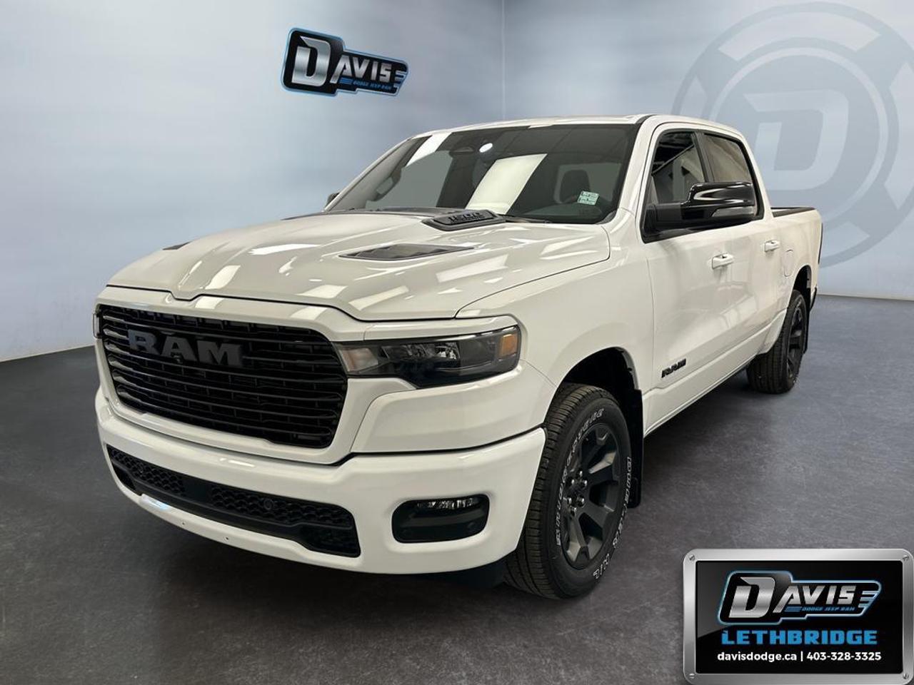<b>Navigation, Apple CarPlay, Android Auto, 360 Camera, Heated Seats!</b><br /> <br /> Dominate workdays and weekends alike with the 2026 Ram 1500, where capability meets class.<br /> <br />The Ram 1500's unmatched luxury transcends traditional pickups without compromising its capability. Loaded with best-in-class features, it's easy to see why the Ram 1500 is so popular. With the most towing and hauling capability in a Ram 1500, as well as improved efficiency and exceptional capability, this truck has the grit to take on any task.<br /> <br />This Bright White Crew Cab 4X4 pickup has an Automatic transmission and is powered by a 420HP 3.0L Straight 6 Cylinder Engine. <br /> <br /> Our 1500's trim level is Sport. This Ram 1500 in Sport trim rewards you with front heated seats, a leather-wrapped heated steering wheel, a 360 camera system, a 10-speaker Alpine audio, and a 12-inch infotainment screen with inbuilt navigation, Apple CarPlay and Android Auto, and 4G LTE Wi-Fi hotspot. Additional features include class IV towing equipment, aluminum wheels, power adjustable pedals, intersection collision assist, evasion assist, lane keep assist with lane departure warning, and even more! This vehicle has been upgraded with the following features: Navigation, Apple CarPlay, Android Auto, 360 Camera, Heated Seats, Heated Steering Wheel, Aluminum Wheels.<br /><br /> <br />To apply right now for financing use this link: <a href=https://lethbridge.davisdodge.ca/free-credit-check/ target=_blank rel=nofollow noopener noreferrer>https://lethbridge.davisdodge.ca/free-credit-check/</a><br /> <br /><br />As a premier Chrysler, Dodge, Jeep and RAM dealership, Davis Dodge proudly offers an extensive selection of new and used vehicles to meet every drivers needs. Customers across Lethbridge, Fort Macleod, Taber, Claresholm, Coaldale, and beyond trust us for daily vehicle specials, certified service and parts, and a seamless online inventory experience. <br /><br /> With competitive financing options and expert support, we make car buying easy and enjoyable. <br /><br /> Ready to hit the road? Schedule your test drive today at Davis Dodge, your trusted Chrysler, Dodge, Jeep and RAM dealer in Lethbridge, Alberta.<br /><br /> Vehicle pricing offer shown expires 2026-06-30. <br /> Come by and check out our fleet of 60+ used cars and trucks and 100+ new cars and trucks for sale in Lethbridge. o~o