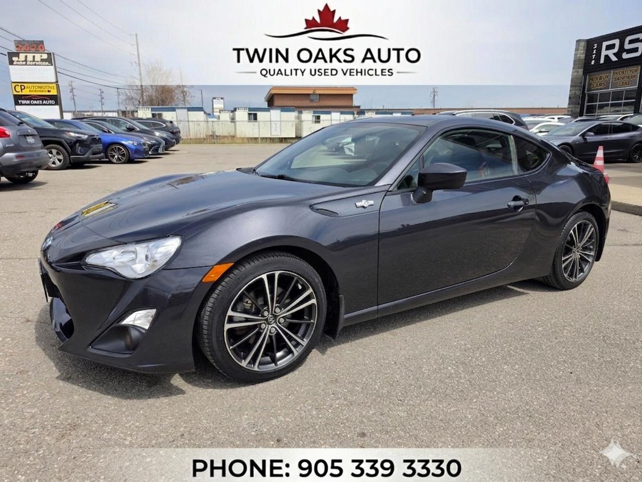 <p data-start=0 data-end=312>The <span class=hover:entity-accent entity-underline inline cursor-pointer align-baseline><span class=whitespace-normal>2016 Scion FR-S</span></span> is a fun-to-drive rear wheel drive coupe with sporty styling, sharp handling, and the kind of driving feel enthusiasts love. Finished with a low, aggressive stance and a driver-focused interior, this FR-S offers the perfect balance of performance and everyday usability.</p><p data-start=314 data-end=596>Powered by a responsive 2.0L 4-cylinder boxer engine paired to a smooth transmission, the FR-S delivers excellent balance, quick steering, and great fuel economy for a sports car. The lightweight chassis and rear wheel drive setup make it one of the most engaging cars in its class.</p><p data-start=598 data-end=615>Features include:</p><ul data-start=617 data-end=868><li data-section-id=1vgba3o data-start=617 data-end=636>2.0L Boxer Engine</li><li data-section-id=x09v9v data-start=637 data-end=655>Rear Wheel Drive</li><li data-section-id=1e35wlb data-start=656 data-end=670>Alloy Wheels</li><li data-section-id=19ghzzm data-start=671 data-end=684>Sport Seats</li><li data-section-id=6hyl4r data-start=685 data-end=709>Bluetooth Connectivity</li><li data-section-id=zutwrf data-start=710 data-end=731>Touchscreen Display</li><li data-section-id=1tas6zj data-start=732 data-end=747>Backup Camera</li><li data-section-id=h2kbia data-start=748 data-end=763>Keyless Entry</li><li data-section-id=1ck5ydw data-start=764 data-end=780>Cruise Control</li><li data-section-id=1h79zxd data-start=781 data-end=799>Air Conditioning</li><li data-section-id=2bmhjx data-start=800 data-end=834>Power Windows, Locks and Mirrors</li><li data-section-id=uo8cba data-start=835 data-end=868>Steering Wheel Mounted Controls</li></ul><p data-start=870 data-end=1075 data-is-last-node= data-is-only-node=>Clean inside and out, this FR-S is a great option for someone looking for an affordable sports car that is reliable, stylish, and fun to drive. A great summer car with sharp looks and strong road presence.</p><p data-start=870 data-end=1075 data-is-last-node= data-is-only-node=>&nbsp;</p><p><strong>Additional Certification Cost</strong>: The full certification cost for this vehicle is <strong>$790 + HST</strong>.</p><p><strong>What&rsquo;s Included with Certification</strong>:</p><ul><li>The vehicle will be delivered with a <strong>valid safety certification</strong> and a <strong>36-day safety item warranty</strong> for your peace of mind.</li><li>A <strong>fresh oil change</strong> will be performed, and all fluids will be topped up.</li><li>The vehicle will be <strong>professionally detailed</strong>, ensuring it looks and feels like new when you pick it up.</li></ul><p>At <strong>Twin Oaks Auto</strong>, we are committed to providing a <strong>hassle-free car buying experience</strong>. From your first inquiry to driving off in your new car, our goal is to get you on the road quickly and stress-free!</p><p><strong>Financing Options Available!</strong><br>Flexible financing options are available to suit your needs. Contact us for more details.</p><p><strong>Contact Us Today</strong>:<br>📞 <strong>Call Us</strong>: 905-339-3330<br>📍 <strong>Location</strong>: 2470 Royal Windsor Drive, Oakville, Ontario, L6J 7Y2</p><p><br>(Conveniently located between Ford Drive and Winston Churchill Blvd.)</p><p><strong>More Information</strong>:<br>Visit our website at <strong><a href=http://www.twinoaksauto.com>TwinOaksAuto.com</a></strong> to view additional pictures, explore our inventory, and access CARFAX reports.</p><p>&nbsp;</p>