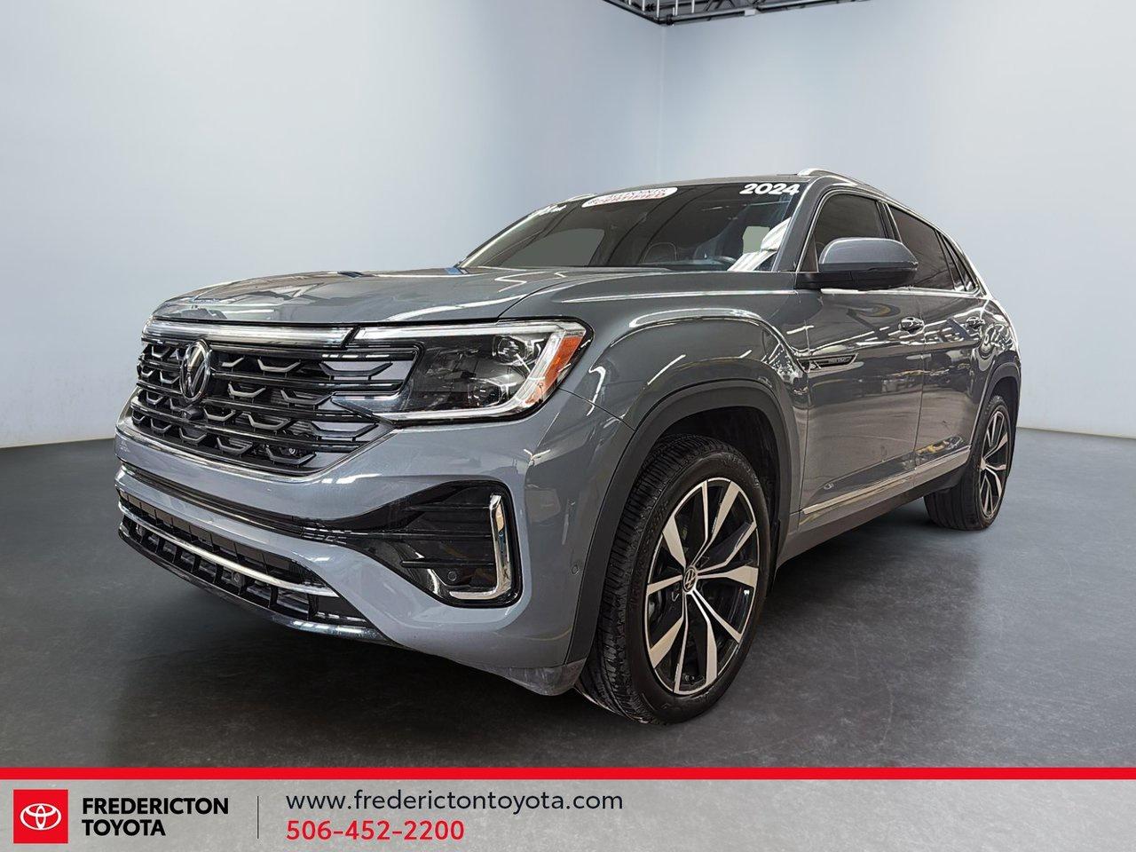 <meta charset=UTF-8 />
<p class=p1>The <span class=s1>2024 Volkswagen Atlas Cross Sport Execline AWD</span> offers premium comfort, bold styling, and advanced technology in a spacious SUV. With its sleek design, panoramic roof, aluminum wheels, and AWD capability, it&rsquo;s built for both daily driving and long road trips.

<p class=p1>Inside, enjoy a refined cabin with leather seating, heated and ventilated front seats, heated rear seats, a heated steering wheel, and power seats with memory. A heads-up display, navigation system, premium sound system, and smart device integration keep you connected and in control.

<p class=p1>Convenience features like a hands-free power liftgate, remote start, automatic parking, and an aerial view camera system make driving effortless.

<p class=p1>Safety includes Blind Spot Monitoring, Lane Keeping Assist, Lane Departure Warning, Adaptive Cruise Control, Front and Rear Collision Mitigation, Cross-Traffic Alert, Automatic High Beams, and driver monitoring.

<p class=p1>Why choose to buy from Fredericton Toyota? When you buy from us, you&rsquo;re not just a customer. You&rsquo;re part of the family, and we&rsquo;re committed to providing exceptional service every step of the way.