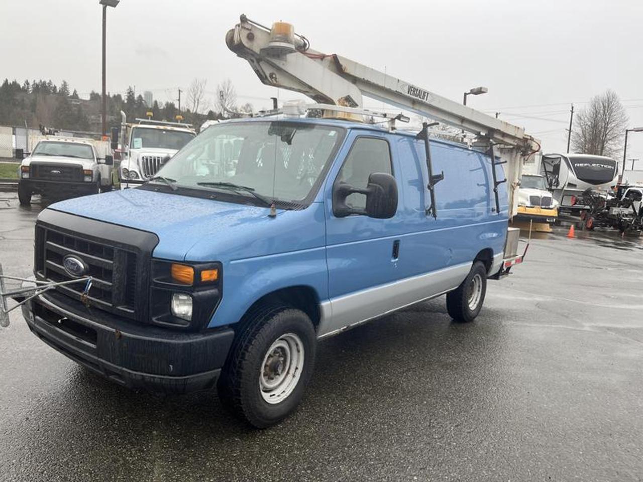 Experience versatility with this 2009 Ford Econoline E-350 Super Duty Cargo Van, equipped with a 29 ft Versa Lift Bucket, ideal for utility, maintenance, and service tasks. Powered by a robust 5.4L V8 engine, this reliable workhorse features an automatic transmission and RWD for smooth operation. With a GVW of 5,500 kg and 190,673 km, its built to handle your toughest jobs. Enjoy features like AM/FM radio and 4-wheel ABS in a spacious and functional blue exterior with a comfortable grey cloth interior. Purchase with confidence, as it includes a detailed report, vehicle history, and a satisfaction guarantee. Truck Certificate and Decal valid to April 2027 and Boom  Certificate and Decal valid to April 2027  $20,730.00 plus $375 processing fee, $21,105.00 total payment obligation before taxes.   Listing report, warranty, contract commitment cancellation fee, financing available on approved credit (some limitations and exceptions may apply). All above specifications and information is considered to be accurate but is not guaranteed and no opinion or advice is given as to whether this item should be purchased. We do not allow test drives due to theft, fraud, acts of vandalism and undetectable impaired driving. Instead we provide the following benefits: Complimentary Warranty (with options to extend), Limited Money Back Satisfaction Guarantee on Fully Completed Contracts, Contract Commitment Cancellation, and an Open-Ended Sell-Back Option. Ask seller for details or call 604-522-REPO(7376) to confirm listing availability.