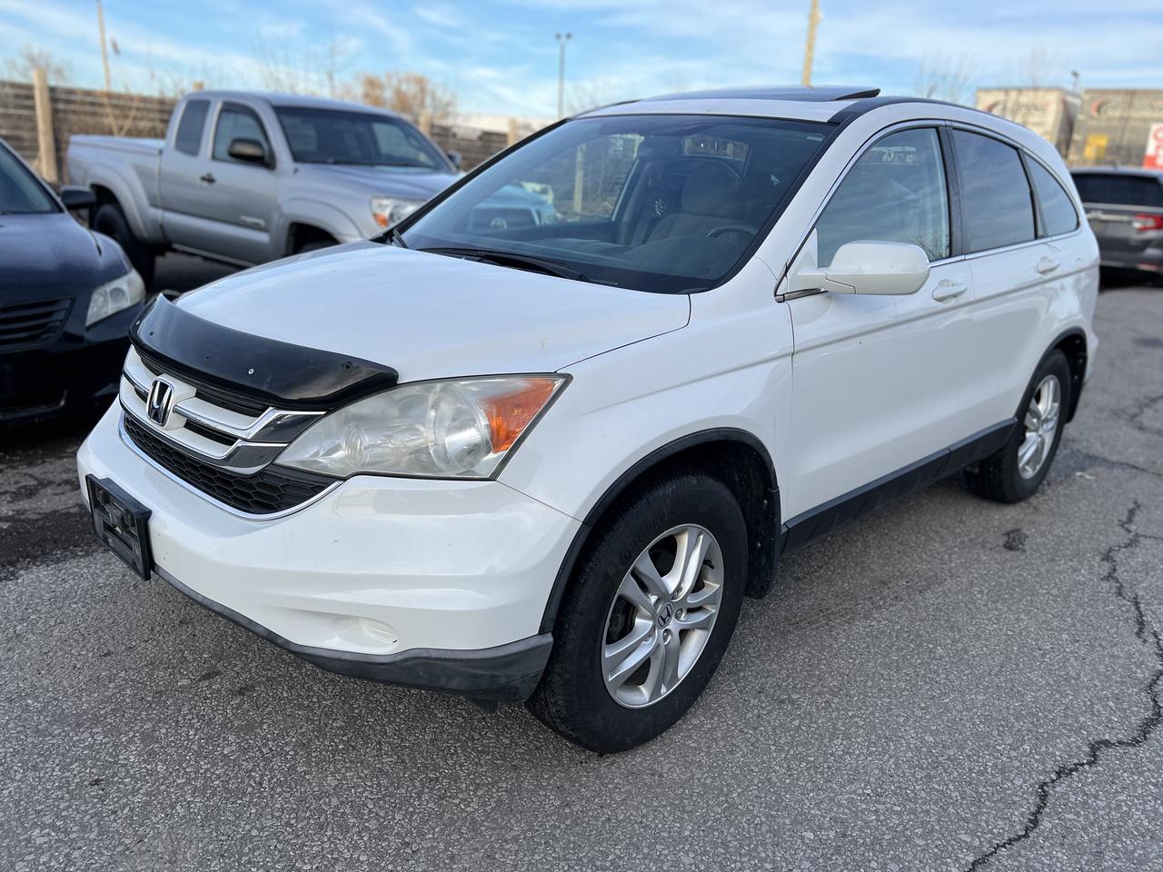 Just Arrived! White 2010 Honda CR-V EX 4WD. 227,138 Kms. Regularly Serviced! Runs and Drives Well. VERY CLEAN. NO RUST. Local Ontario Vehicle. Loaded with Sunroof, Power Windows, Power Locks, Power Side Mirrors, Keyless Entry, Alarm, Alloy Wheels, CD/AUX, A/C, and Cruise Control. <br/> <br/> <br/> *Safety Certified at no extra cost* <br/> <br/> <br/> *Welcome to get vehicle checked by any mechanic before purchase* <br/> <br/> <br/> All in price : $8,499 plus HST and Licensing. <br/> Call : 647-303-2585 or 647-631-8755 <br/> <br/> <br/> Brampton Auto Center <br/> 69 Eastern Avenue, Brampton ON, L6W 1X9. Unit 206 <br/> <br/> <br/> Brampton Auto Center, welcomes you! Family owned dealership located in the GTA. We take pride in our work. Customer service is our priority. Full disclosure with honesty. We are OMVIC registered and proud member of the UCDA. You are welcomed to get the vehicle checked by any mechanic before purchase, for quality assurance. Financing available for all types of credit! Good, bad or no credit. No problem! We will get you approved. Warranty options available for any year, make or model! Contact dealer for more details. <br/> <br/> <br/> <br/> <br/> E-mail : info@bramptonautocenter.ca <br/>