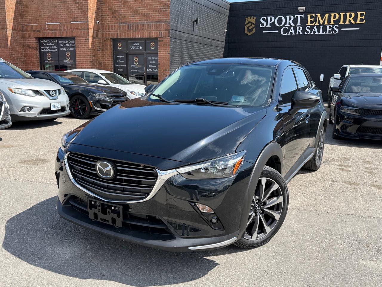 <p>*FULLY LOADED* *GT AUTO* *AWD* *HEATED SEATS* *AUTOMATIC* *BLIND SPOT MONITORING* *REVERSE CAMERA* Safety Certificate NOT included in the price | SAFETY: $699 Year :2020 Make: Mazda Model: CX-3 Trim: GT Auto AWD Kms: 136,570 Finance Price: $15,880 Cash Price: $16,880 Sport Empire Cars, offering a beautiful Mazda CX-3 GT Auto AWD with ONLY 136,570 kms!! For the affordable price of $15<span id=jodit-selection_marker_1783452752260_02760501190478548 data-jodit-selection_marker=start style=line-height: 0; display: none;></span>,880+HST and licensing. Beautiful Black exterior with a Black leather interior. Professionally detailed and ready to go. Perfect combination of reliability, comfort and luxury. Buy with Trust with an Ontario registered dealer. Please note: The listed price is a finance-only special. If you wish to purchase the vehicle with cash, a $1,000 premium will be added to the sale price. ** In accordance with OMVIC regulations, please be advised that the vehicle being offered is not currently certified, e-tested or drivable. Certification is available for an additional fee starting from $699. With our safety package the vehicle comes with a 36 day safety standard warranty, complimentary oil change and inspection report VIN: JM1DKFD78L1473889</p>