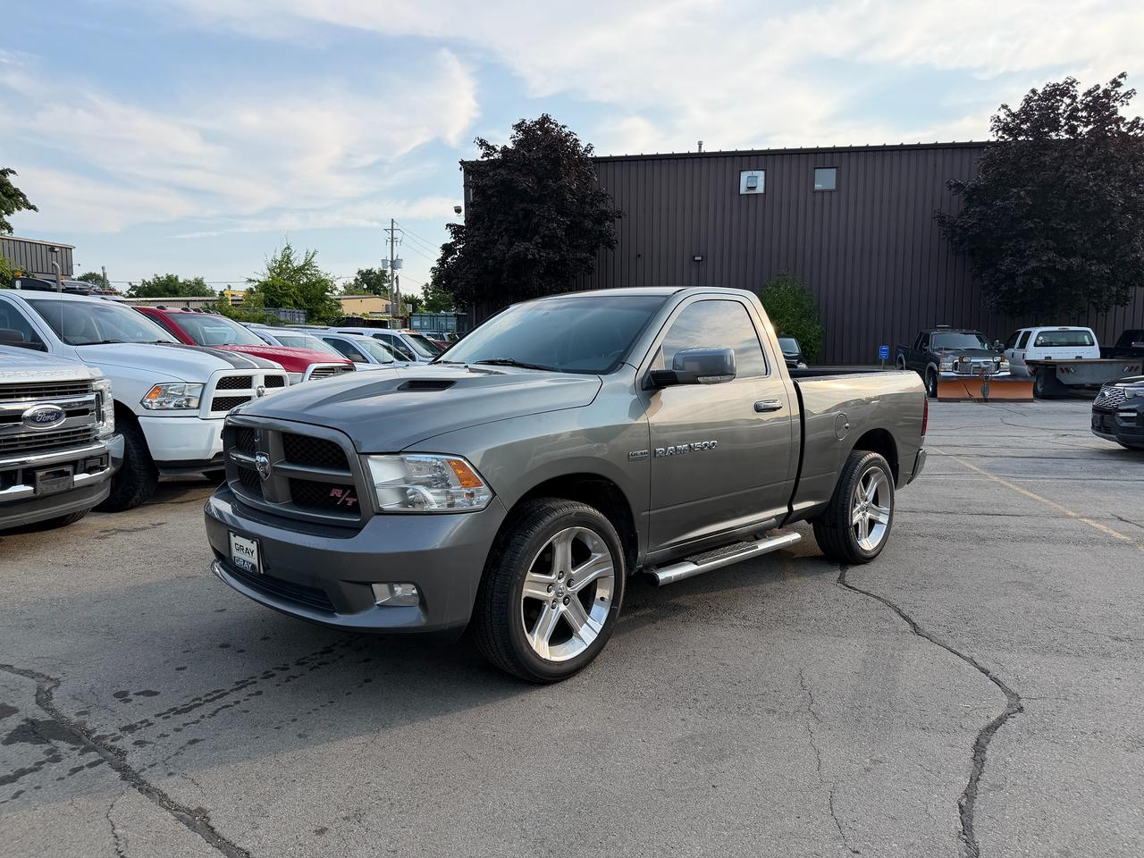 <p><span data-sheets-root=1>RAM 1500 Sport R/T. A rare find for the true truck enthusiast with a limited production run. Key features include street-tuned performance with a 4.10 rear axle ratio for better acceleration, R/T badged front grill, 22 Forged Polished Alloys, Sport Bucket Seats, Uconnect Nav & Remote Start.</span></p><p><span data-sheets-root=1>&bull;All prices are exclusive of safety, licensing, fuel charges and HST&bull;Safety Certification is available at $599 for sedans/SUVs and $799 for trucks &bull;Dealer processing fees are $495 and include a 3 month warranty&bull;Financing and long term extended warranty options are also available. Save with Finance! Special Finance Price is the listed price. (All special finance prices are firm). Any warranty included with the vehicle is only applicable with a Safety Standards Certificate. &bull;This vehicle is located at our Burlington dealership at <strong>3455 Landmark Rd, Burlington ON</strong>. Please reach out for more details.</span></p>