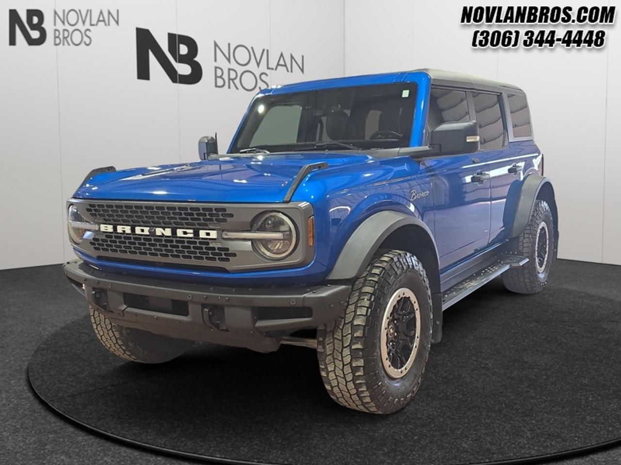 <b>Leather Seats, 360-Degree Camera, Wireless Charging, Luxury Package, Navigation!</b><br> <br> Check out our great inventory of pre-owned vehicles at Novlan Brothers!<br> <br>This incredibly capable off-road ripper comes with endless amounts of technology and street credibility. This 2021 Ford Bronco is for sale today in Paradise Hill.<br> <br>After years of research and endless miles of driving, the Ford Bronco is back and better than ever! Its been torture-tested in some of the toughest and most grueling places in the world and is now ready for your off-road adventures to begin. With plenty of room for your friends and family, plus all of their gear, this impressive SUV was designed, engineered and Built Ford Tough so you can depend on it to get you out into the wild and back again.<br> <br>This SUV has 177,806 km. Its Velocity Blue Metallic in colour. It has a 10 Speed Automatic transmission and is powered by a 315HP 2.7L V6 Cylinder Engine. <br> <br> Our Broncos trim level is Badlands 4X4. Torture tested in the most extreme terrain, this Bronco Badlands comes with some impressive off-road equipment such as Bilstein monotube shocks, a front and rear locking differential, a terrain management system with G.O.A.T. modes, tons of extra storage and removable doors. This impressive off-road vehicle also includes SYNC 4 with a large touchscreen display, wireless Android Auto and Apple CarPlay, Ford Co-Pilot360 featuring pre-collision assist, forward collision mitigation and a rear view camera, durable seat material, a 50-50 split-folding rear bench seat and a fully molded rubberized floor to make cleaning up after your weekend adventures a breeze. This vehicle has been upgraded with the following features: Leather Seats, 360-Degree Camera, Wireless Charging, Luxury Package, Navigation, Premium Audio, Heated Seats.<br> To view the original window sticker for this vehicle view this <a href=http://www.windowsticker.forddirect.com/windowsticker.pdf?vin=1FMEE5DP1MLA65824 target=_blank>http://www.windowsticker.forddirect.com/windowsticker.pdf?vin=1FMEE5DP1MLA65824</a>. <br/><br> <br>To apply right now for financing use this link: <a href=http://novlanbros.com/credit/ target=_blank>http://novlanbros.com/credit/</a><br> <br/><br>The Novlan family is owned and operated by a third generation and committed to the values inherent from our humble beginnings.<br> Come by and check out our fleet of 20+ used cars and trucks and 80+ new cars and trucks for sale in Paradise Hill.  o~o
