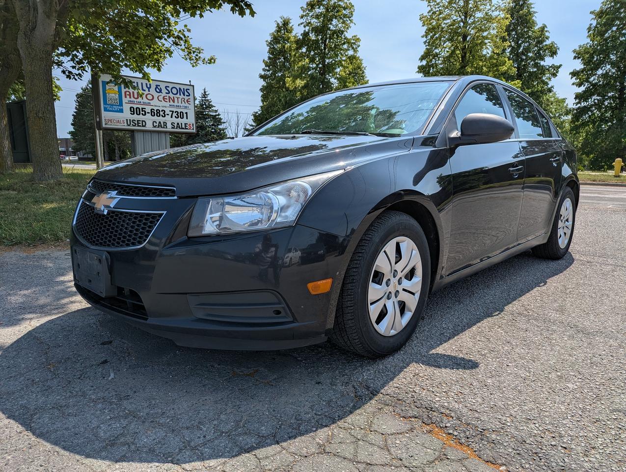 2012 Chevrolet Cruze "Gas MISER" certified + FREE 6M warranty Photo0