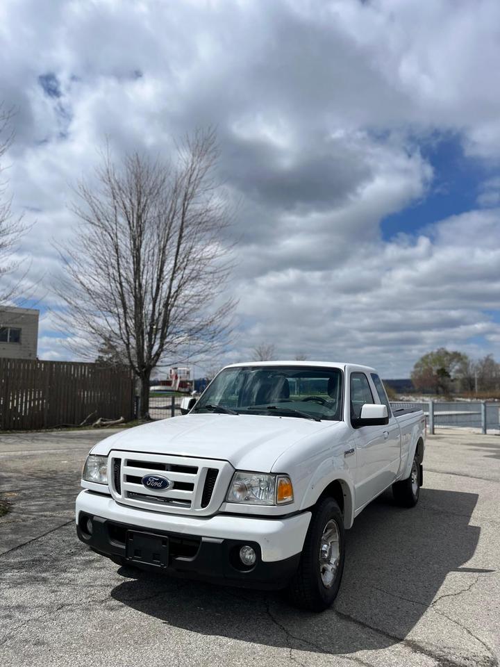 <p data-path-to-node=6>Looking for a truck that&rsquo;s built to last and simple to maintain? This <strong data-path-to-node=6 data-index-in-node=70>2011 Ford Ranger Super Cab</strong> is a rare find for the purist truck owner. Equipped with the powerful <strong data-path-to-node=6 data-index-in-node=169>4.0L V6 engine</strong> and a <strong data-path-to-node=6 data-index-in-node=190>manual transmission</strong>, this Ranger offers total control and legendary reliability.</p><p data-path-to-node=7>This is a <strong data-path-to-node=7 data-index-in-node=10>Clean Carfax</strong> vehicle with <strong data-path-to-node=7 data-index-in-node=36>no accidents</strong>, and the history is Carfax verified. It&rsquo;s a straightforward, rugged workhorse that avoids the electronic headaches of newer trucks.</p><h3 data-path-to-node=8><strong data-path-to-node=8 data-index-in-node=0>Vehicle Highlights</strong></h3><ul data-path-to-node=9><li><p data-path-to-node=9,0,0><strong data-path-to-node=9,0,0 data-index-in-node=0>Engine:</strong> 4.0L V6 &ndash; The most sought-after engine for this generation.</p></li><li><p data-path-to-node=9,1,0><strong data-path-to-node=9,1,0 data-index-in-node=0>Transmission:</strong> 5-Speed Manual for those who prefer a true driving experience.</p></li><li><p data-path-to-node=9,2,0><strong data-path-to-node=9,2,0 data-index-in-node=0>Mechanical:</strong> Safety Certified and ready for the road.</p></li><li><p data-path-to-node=9,3,0><strong data-path-to-node=9,3,0 data-index-in-node=0>Exterior:</strong> Includes a <strong data-path-to-node=9,3,0 data-index-in-node=21>Bed Cover</strong> (Tonneau) to keep your gear dry and secure.</p></li></ul><h3 data-path-to-node=10><strong data-path-to-node=10 data-index-in-node=0>The Old School Spec (Less to go wrong!)</strong></h3><p data-path-to-node=11>This truck was built for simplicity and durability. It features:</p><ul data-path-to-node=12><li><p data-path-to-node=12,0,0>Manual Windows & Door Locks</p></li><li><p data-path-to-node=12,1,0>Manual Driver & Passenger Seats</p></li><li><p data-path-to-node=12,2,0>No A/C (Ideal for those who prefer the windows down)</p></li><li><p data-path-to-node=12,3,0>No Cruise Control</p></li></ul><h3 data-path-to-node=13><strong data-path-to-node=13 data-index-in-node=0>Condition & Value</strong></h3><ul data-path-to-node=14><li><p data-path-to-node=14,0,0><strong data-path-to-node=14,0,0 data-index-in-node=0>163,900 km</strong> (Low for a 2011 V6 Ranger).</p></li><li><p data-path-to-node=14,1,0><strong data-path-to-node=14,1,0 data-index-in-node=0>Safety Certified</strong> included in the price.</p></li><li><p data-path-to-node=14,2,0><strong data-path-to-node=14,2,0 data-index-in-node=0>Warranty Available:</strong> Ask us about extended coverage options for extra peace of mind.</p></li></ul><hr data-path-to-node=15><p data-path-to-node=16><strong data-path-to-node=16 data-index-in-node=0>Interested?</strong> Come see it in person at <strong data-path-to-node=16 data-index-in-node=37>M.A Used Auto Sales</strong>. This manual V6 combo wont stay on the lot for long!</p><p data-path-to-node=17><strong data-path-to-node=17 data-index-in-node=0>Location:</strong> 758 King St East, Hamilton, Ontario</p><p data-path-to-node=18><strong data-path-to-node=18 data-index-in-node=0>Contact:</strong> Message us today to book a test drive!</p><p data-path-to-node=19><em data-path-to-node=19 data-index-in-node=0>> Note: Price does not include HST and licensing fees.</em></p>