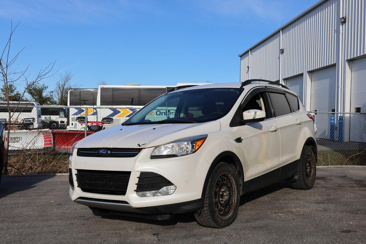 <p class=p1>2015 Ford Escape SE EcoBoost AWD - Leather, Backup Camera, Heated Seats, Bluetooth and More.</p><p class=p1>Odometer: 183,000 KM</p><p class=p1>Vehicle Pre Sale Inspection Report is Included In Listing Images.</p><p class=p1>OEM Alloy Wheels Included with Vehicle.</p><p class=p1>This vehicle is being sold as-is, if not certified then as per OMVIC regulations the vehicle is deemed to be not drivable and not certified.</p><p class=p1>Call Us:&nbsp;(416) 766-6226</p><p class=p1>Monaco Motorcars Inc.</p><p class=p1>Location: 112 King St, Barrie, ON</p><p class=p1>Business Hours:</p><p class=p1>Monday - Friday: 10am - 6pm</p><p class=p1>Saturday: 10am - 5pm</p><p class=p1>Sunday : Closed</p><p class=p1>www.monacomotorcars.com</p><p class=p1>We Are Proud To Serve Clients All Over Canada & Ontario - Toronto, Markham, Richmond Hill, Mississauga, Oshawa, Etobicoke, Newmarket, Pickering, Whitby, Ajax, North York, Scarborough, Barrie, Orangeville, Waterloo, Milton, Kitchener, Ottawa, Aurora, London, Kingston, Hamilton, Muskoka, Belleville, Brant, Brantford, Brockville, Cornwall, Windsor, Sudbury, Guelph, Orillia, Sarnia, Timmins, Thunder Bay, Welland, Pembroke, St Catharines, St. Thomas, Thorold, Ottawa, Owen Sound, Haldimand County, Kenora and Niagara Falls.</p>