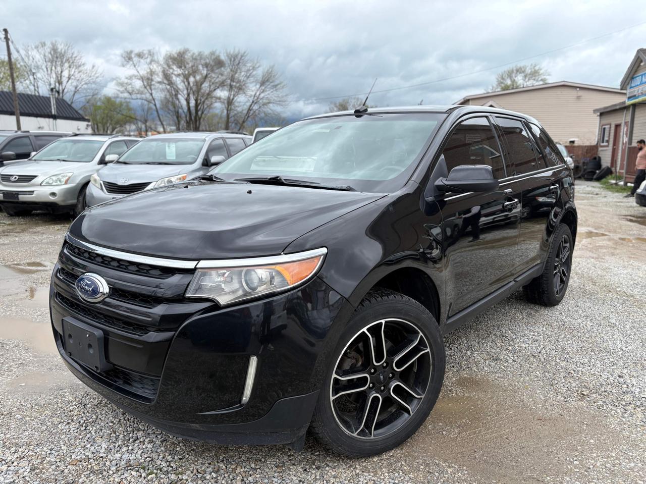<p><p><strong>2013 Ford Edge SEL  Fully Loaded | Safety Included | 1-Year Powertrain Warranty</strong></p><p>Very clean and well-maintained <strong>2013 Ford Edge SEL</strong>, offering a comfortable ride, strong performance, and a well-equipped interior. This SUV is a practical choice for daily driving, family use, and highway travel.</p><p>The vehicle comes <strong>Ontario safety certified and ready for the road</strong>, with a <strong>1-Year Powertrain Warranty included</strong>.</p><p> Fully loaded SEL trim<br> Safety certified<br> 1-Year Powertrain Warranty included<br> Very clean condition inside and out</p><p><strong>Features</strong></p><p>Leather interior<br>Heated seats<br>Backup camera<br>Bluetooth connectivity<br>Power seats<br>Alloy wheels<br>Dual-zone climate control<br>Spacious interior with flexible cargo space</p><p><strong>Condition and driving</strong></p><p>Drives smooth and comfortable<br>Well maintained<br>Fully inspected and safety ready</p><p>This Edge offers a good balance of comfort, space, and reliability, making it ideal for families or anyone needing a versatile SUV.</p><p><strong>Warranty</strong></p><p>1-Year Powertrain Warranty Included</p><p>Coverage includes major components such as:</p><p> Engine<br> Transmission<br> Differential</p><hr><p><strong>AUTO NATION CAR SALES & SERVICES</strong><br>9300 Tecumseh Rd. East, Windsor, ON N8R 1A2<br>Call or Text: 226-246-2429</p><p>We accept Debit / Visa / Mastercard / AMEX.<br>All-in pricing (plus HST & licensing only).</p><span id=jodit-selection_marker_1776712289124_9205650210606178 data-jodit-selection_marker=start style=line-height: 0; display: none;></span><br></p>