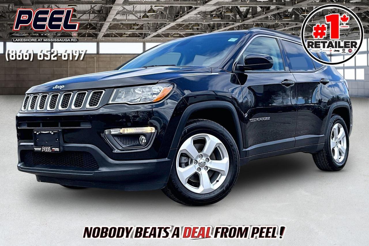 COME SEE WHY NOBODY BEATS A DEAL FROM PEEL! Your Source for ALL make and models used cars and trucks. The True #1 Stellantis Retailer in Ontario for 14 years and running!! (*)

2018 Jeep Compass North 4X2 | 2.4L I-4 Engine | Diamond Black Crystal Pearl | Heated Premium Cloth/Leatherette Bucket Seats | Uconnect 5" Display | Heated Steering Wheel | Remote Start | All-weather Floor Mats 

Clean Carfax

Comfort focused and easy to live with, this 2018 Jeep Compass North is a smart choice for drivers who want Jeep style without the bulk, featuring heated premium cloth and leatherette bucket seats, a heated steering wheel, remote start, and a tidy, upright cabin that makes daily commutes and errands feel relaxed. The Uconnect 5 inch display keeps controls straightforward, while Bluetooth connectivity and intuitive menus make calls and music simple on the move, and all weather floor mats help keep the interior clean through changing seasons. Outside, Diamond Black Crystal Pearl gives a sharp, upscale look, and the efficient 2.4L engine with smooth front wheel drive delivers dependable performance and easy parking around town. With a Clean Carfax history and a comfort driven spec that is hard to find at this price point, this Compass North is a practical, value packed SUV that fits everyday life perfectly.
______________________________________________________

Engage & Explore with Peel Chrysler: Whether youre inquiring about our latest offers or seeking guidance, 1-866-652-6197 connects you directly. Dive deeper online or connect with our team to navigate your automotive journey seamlessly.

WE TAKE ALL TRADES & CREDIT. WE SHIP ANYWHERE IN CANADA! OUR TEAM IS READY TO SERVE YOU 7 DAYS!
______________________________________________________
Our advertised prices are for consumers (i.e end users) only. 

*FREE CarFax (click the link above to check it out at no cost to you!)*

*FULLY CERTIFIED! (Have you seen some of these other dealers stating in their advertisements that certification is an additional fee? NOT HERE! Our certification is already included in our low sale prices to save you more!)

(*) Based on the Eastern Business Center National Ranking reported sales to actual customers, not including demonstrators.
______________________________________________________

Peel Chrysler  A Trusted Destination: Based in Port Credit, Ontario, we proudly serve customers from all corners of Ontario and Canada including Toronto, Oakville, North York, Richmond Hill, Ajax, Hamilton, Niagara Falls, Brampton, Thornhill, Scarborough, Vaughan, London, Windsor, Cambridge, Kitchener, Waterloo, Brantford, Sarnia, Pickering, Huntsville, Milton, Woodbridge, Maple, Aurora, Newmarket, Orangeville, Georgetown, Stouffville, Markham, North Bay, Sudbury, Barrie, Sault Ste. Marie, Parry Sound, Bracebridge, Gravenhurst, Oshawa, Ajax, Kingston, Innisfil and surrounding areas. On our website www.peelchrysler.com, you will find a vast selection of new vehicles including the new and used Ram 1500, 2500 and 3500. Chrysler Grand Caravan, Chrysler Pacifica, Jeep Cherokee, Wrangler and more. All vehicles are priced to sell. We deliver throughout Canada. website or call us 1-866-652-6197. 

Disclaimer Statement: At Peel Chrysler, your satisfaction is our priority. While many pre-owned vehicles originally come with two keys, variations may occur based on trade-ins, and all Peel Chrysler Pre-Owned Vehicles come standard with one key. Any extras provided by the previous owner will be included with your purchase, and additional keys can be bought at the time of sale. Online prices and payments are for finance purchases. Used vehicles that are being financed are subject to a $499 (^$1500 non-prime) financing fee, while cash purchases (certified cheque, bank draft, or wire transfer) on used vehicles have a $2,000 surcharge ( online price + $2,000). Cash purchases of new vehicles only incur applicable taxes and licensing fees, and those priced above $100,000 (including accessories or add-ons) are subject to a federal luxury tax. Optional finance and lease terms are available, and if trading in a vehicle with an outstanding loan balance requiring Peel Chrysler to facilitate the lien payout, a Lien Payout Fee of $349 applies. Prices, rates, and payments are subject to change without notice. While we strive for accuracy, occasional technical or human errors may occur, so we encourage verifying all vehicle details, including features, options, materials, and specifications, with a Peel Chrysler representative by contacting us or visiting our dealership. Experience seamless convenience with our nationwide delivery options. Visit our website or contact us for more details.