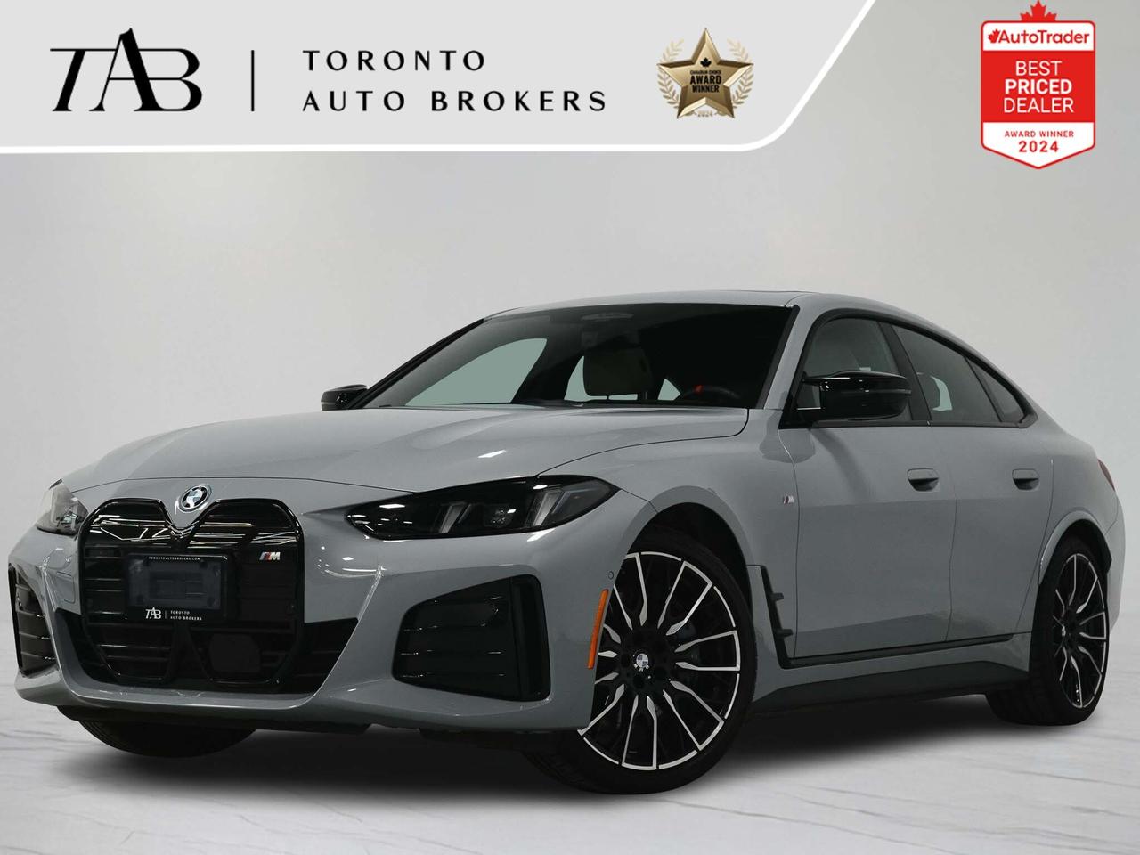 This 2025 BMW i4 M50 xDrive is a local Ontario vehicle with remaining manufacturer warranty until December 9th, 2028 or up to 80,000 kms. Blending all-electric performance with everyday luxury, the i4 M50 delivers an exhilarating driving experience with dual-motor xDrive all-wheel drive and true M engineering. With instant torque, sharp handling from the Track Package, and a refined, tech-forward interior, this Gran Coupe offers the perfect balance of performance and practicality.

Key features include:

Premium Enhanced Package (ZMC)  $6,250.00 CAD
M Enhanced Track Package (Z0W)  $2,500.00 CAD
M Sport Pro Package (ZPZ)  $2,300.00 CAD
Advanced Driver Assistance Package (ZYU)  $2,000.00 CAD
Power Driver Seat, Seat Trim, Leather Seats  $1,900.00 CAD
Interior Trim, Woodgrain Interior Trim  $250.00 CAD
Driving Assistant Professional (Adaptive Cruise Control, Lane Keeping Assist)
Heated Front and Rear Seats
Ventilated Front Seats
Heated Steering Wheel
Wireless Charging & Apple CarPlay / Android Auto

NOW OFFERING 3 MONTH DEFERRED FINANCING PAYMENTS ON APPROVED CREDIT. 

WE OFFER THE BEST FINANCE RATES, AND DONT CHARGE ANY FINANCING FEE

Looking for a top-rated pre-owned luxury car dealership in the GTA? Look no further than Toronto Auto Brokers (TAB)! Were proud to have won multiple awards, including the 2024 AutoTrader Best Priced Dealer, the 2026 Best in Business award, the 2025 CarGurus Award, the 2026 Top Choice Award, the 2026 Dealer Rater Consumer Satisfaction Award, the 2026 Canadian Choice Award, the 2026 Three Best Rated Dealer Award, and many more!

With 30 years of experience serving the Greater Toronto Area, TAB is a respected and trusted name in the pre-owned luxury car industry. Our 30,000 sq.Ft indoor showroom is home to a wide range of luxury vehicles from top brands like BMW, Mercedes-Benz, Audi, Porsche, Land Rover, Jaguar, Aston Martin, Bentley, Maserati, and more. And we dont just serve the GTA, were proud to offer our services to all cities in Canada, including Vancouver, Montreal, Calgary, Edmonton, Winnipeg, Saskatchewan, Halifax, and more.

At TAB, were committed to providing a no-pressure environment and honest work ethics. As a family-owned and operated business, we treat every customer like family and ensure that every interaction is a positive one. Come experience the TAB Lifestyle at its truest form, luxury car buying has never been more enjoyable and exciting!

We offer a variety of services to make your purchase experience as easy and stress-free as possible. From competitive and simple financing and leasing options to extended warranties, aftermarket services, and full history reports on every vehicle, we have everything you need to make an informed decision. We welcome every trade, even if youre just looking to sell your car without buying, and when it comes to financing or leasing, we offer same day approvals, with access to over 50 lenders, including all of the banks in Canada. Feel free to check out your own Equifax credit score without affecting your credit score, simply click on the Equifax tab above and see if you qualify.

So if youre looking for a luxury pre-owned car dealership in Toronto, look no further than TAB! We proudly serve the GTA, including Toronto, Etobicoke, Woodbridge, North York, York Region, Vaughan, Thornhill, Richmond Hill, Mississauga, Scarborough, Markham, Oshawa, Peteborough, Hamilton, Newmarket, Orangeville, Aurora, Brantford, Barrie, Kitchener, Niagara Falls, Oakville, Cambridge, Kitchener, Waterloo, Guelph, London, Windsor, Orillia, Pickering, Ajax, Whitby, Durham, Cobourg, Belleville, Kingston, Ottawa, Montreal, Vancouver, Winnipeg, Calgary, Edmonton, Regina, Halifax, and more.

Call us today or visit our website to learn more about our inventory and services. And remember, all prices exclude applicable taxes and licensing, and vehicles can be certified at an additional c