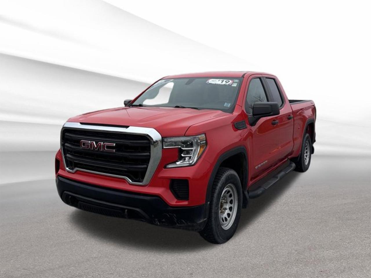 Meet the 2019 GMC Sierra 1500 Base, a full-size pickup built for honest capability and everyday dependability. Finished in Red and equipped with four doors, this used truck offers the strength of a 5.3-litre gas V8, automatic transmission, and four-wheel drive for confident travel in Halifax and beyond.With 94,042 km on the odometer, this 2019 GMC Sierra 1500 Base is ready for work, errands, and weekend towing. It delivers the rugged character truck buyers want, along with a practical cabin and a durable design that suits Canadian roads, changing weather, and demanding tasks.FEATURES OF THE Sierra 1500 Base5.3-litre gas V8 powertrainAutomatic transmission for easy drivingFour-wheel drive for added tractionFour-door cab for daily practicalityADVANCED SAFETY FEATURESStability control helps maintain road confidenceTraction control supports slippery road gripFour-wheel anti-lock braking system includedTire pressure monitoring adds driving awarenessPERFORMANCE AND EFFICIENCY5.3-litre V8 delivers solid pulling powerAutomatic transmission provides smooth daily operationFour-wheel drive handles rougher road conditionsGas engine supports proven truck durabilityCOMFORT AND CONVENIENCEFour-door layout improves passenger accessSpacious cabin supports daily driving comfortEasy step-in height for regular usePractical controls keep operation simpleTECHNONOLGY AND CONNECTIVITYClear driver information display for essentialsSimple dashboard layout aids quick useEasy-to-read gauges support safer drivingUseful connectivity features may vary by unitTRUCK FEATURESBuilt to handle towing and haulingPickup bed supports cargo flexibilityFour-wheel drive aids jobsite tractionStrong V8 suits demanding truck tasksCARGO SPACEOpen bed handles bulky gear easilyCabin storage supports smaller daily itemsFour-door design adds interior versatilityPickup box suits work and recreationAWARDS & RECOGNITIONS2019 North American Truck of the Year finalistWHAT OTHER OWNERS LIKEStrong V8 power for daily tasksComfortable ride for a full-size truckConfident four-wheel drive capabilityPractical cabin and useful cargo bedIf you need a truck that feels strong, simple, and ready to work, this 2019 GMC Sierra 1500 Base is a smart choice. Its V8 power, automatic transmission, and four-wheel-drive setup make it well suited for towing, hauling, and year-round driving around Nova Scotia.This GMC pickup brings the utility many drivers want without overcomplicating the experience. For buyers shopping at Steele Halifax Chrysler Dodge Jeep Ram FIAT in Halifax, this red 2019 GMC Sierra 1500 Base offers proven full-size truck capability in a practical used package.This 2019 GMC Sierra 1500 Bases VIN is: 1GTR9AEF3KZ326003.We invite you to book a viewing and test drive at your earliest convenience