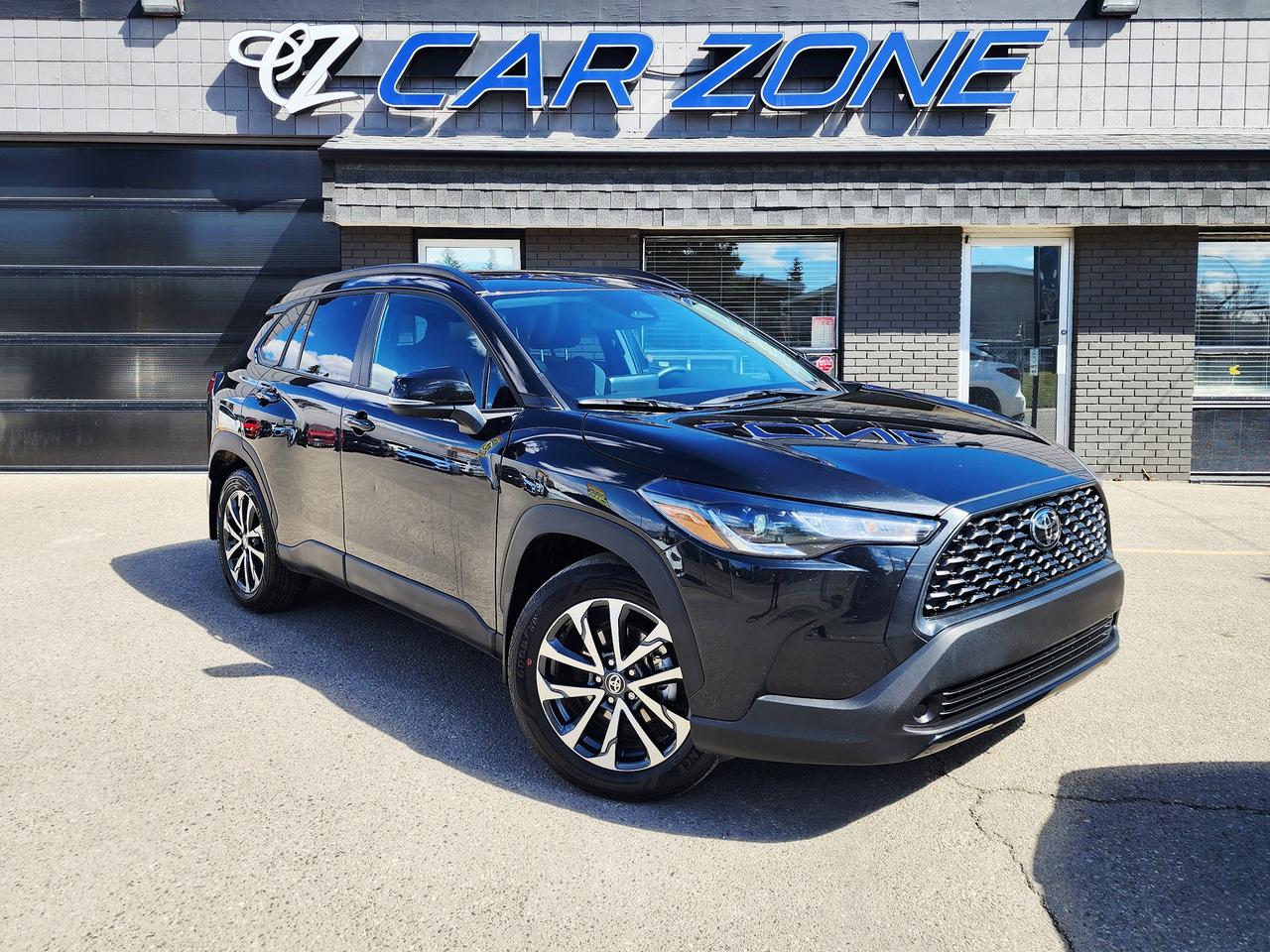 <p>Looking for a versatile and reliable SUV thats perfect for navigating Canadian roads? Then check out this stunning, pre-owned 2025 Toyota Corolla Cross LE Premium, now available at Car Zone! This sleek black beauty boasts a comfortable black interior and is ready to impress. With its fuel-efficient 2L V4 engine and smooth Variable / CVT transmission, youll enjoy a responsive and enjoyable driving experience, whether youre commuting in the city or exploring the countryside. This well-maintained Corolla Cross has just 48,980 km on the odometer.</p><p>This Corolla Cross LE Premium is loaded with features designed to enhance your driving pleasure. This SUV offers the perfect blend of practicality and style, making it an excellent choice for individuals, couples, or small families. Its All-Wheel Drive system provides added confidence and control in all weather conditions, while its spacious interior and versatile cargo area offer ample room for passengers and gear. Come visit Car Zone today to experience the quality and value this exceptional vehicle has to offer.</p><p>Heres what will make you love this Corolla Cross:</p><ul><li><strong>Sunroof:</strong> Let the sunshine in and enjoy the open-air feeling.</li><li><strong>All-Wheel Drive:</strong> Conquer any road condition with confidence.</li><li><strong>Fuel-Efficient Engine:</strong> Save money at the pump without sacrificing performance.</li><li><strong>Stylish Design:</strong> Make a statement wherever you go with its modern and eye-catching appearance.</li><li><strong>Spacious Interior:</strong> Enjoy a comfortable and roomy cabin for passengers and cargo.</li></ul><p>Looking for Your Dream Car? Call or Come on Down to Car Zone Today!</p><p>Thanks for viewing our Car Zone inventory. All of our vehicles come fully detailed with a Carfax and a mechanical fitness assessment. Drive this home today! Easy financing options. All credit welcome.<a href=http://www.carzonecalgary.com/financing/>&nbsp;</a><strong><a href=http://www.carzonecalgary.com/financing/>APPLY NOW</a>&nbsp;</strong>We even take trades. Same day approvals at&nbsp;<a href=http://www.carzonecalgary.com/><strong>CARZONECALGARY</strong></a> or visit us in person at 2036 36 Street SE Calgary for a hassle free test drive. Let our friendly team of experts book an appointment with you and show you the Car Zone difference! AMVIC licensed dealer.&nbsp;</p>