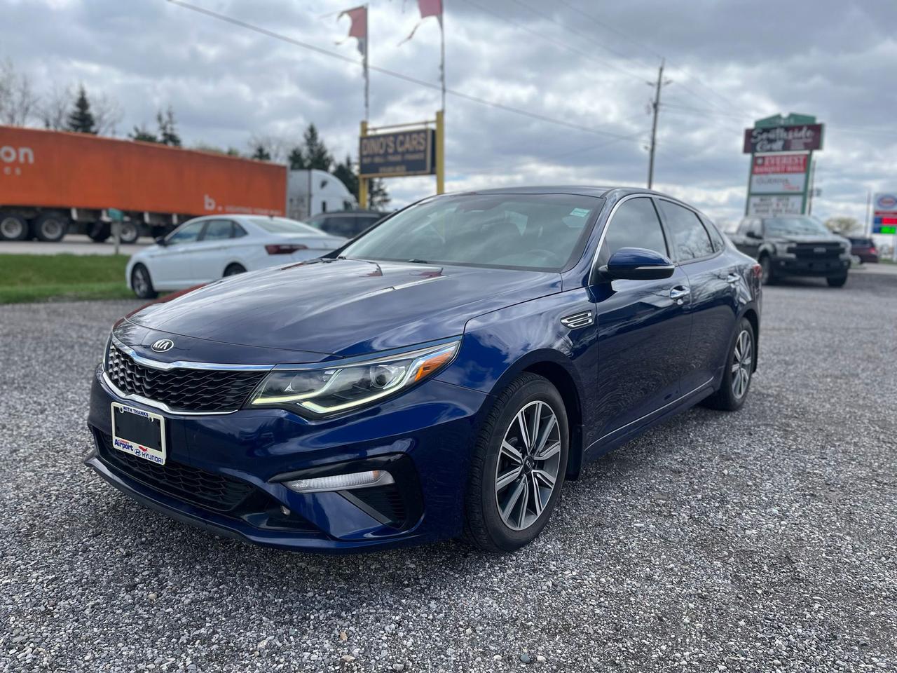 <p>*CERTIFIED,</p><p>We finance</p><p>Contact us for pre approval,</p><p>DINOS CARS</p><p>-Safety certification included in the price ( UNLESS SPECIFIED OTHERWISE ie. AS IS VEHICLES)</p><p>-IF YOU CANT COME TO US WELL DRIVE TO YOU ( WITHIN A REASONABLE DISTANCE TO VIEW) DELIVERY ALSO AVAILABLE</p><p>-Certified Quality Pre owned Vehicles</p><p>-Carfax history report available for every vehicle</p><p>-Licensing and tax are extra</p><p>-Open by Appointment Call or text(519)697-3866</p><p>-4016 Dundas St E, London, ON N5V 5C6</p><p>Looking for a stylish and reliable sedan? Feast your eyes on this beautiful 2020 Kia Optima EX, available now at Dinos Cars! This sleek, four-door sedan is the perfect combination of practicality and sophistication, wrapped in a head-turning blue exterior with a comfortable black interior. With only 85,049km on the odometer, this Optima is ready to provide you with years of driving pleasure. The smooth automatic transmission and efficient gasoline engine make every journey a breeze, whether youre commuting to work or embarking on a weekend getaway.</p><p>This Kia Optima EX is packed with features designed to enhance your driving experience. The front-wheel drive ensures confident handling in various road conditions. This car is ready to provide you with a comfortable and enjoyable ride.</p><p>Here are five features youll love:</p><ul><li><strong>Sleek Design:</strong> Turn heads wherever you go with the Optimas modern and eye-catching design.</li><li><strong>Spacious Interior:</strong> Enjoy a comfortable and roomy cabin, perfect for both drivers and passengers.</li><li><strong>Advanced Safety Features:</strong> Drive with peace of mind knowing youre protected by Kias advanced safety technology.</li><li><strong>Fuel Efficiency:</strong> Save money at the pump with the Optimas impressive fuel economy.</li><li><strong>Reliability:</strong> Benefit from Kias reputation for quality and dependability.</li></ul><p><strong><em>Powered by AutoIntelligence&trade;</em></strong> Vehicle information has been generated using artificial intelligence and is provided for informational purposes only. While efforts are made to ensure accuracy, please confirm all details directly with the dealer.</p>