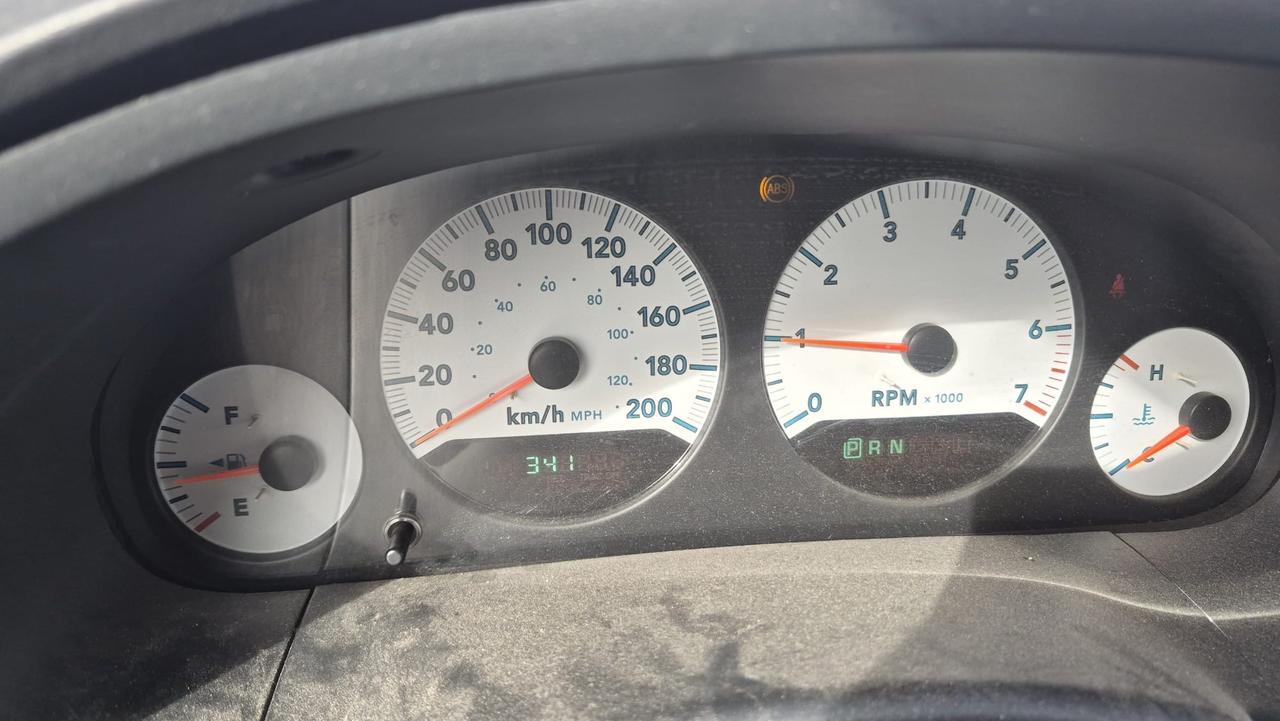 2005 Dodge Grand Caravan NO ACCIDENTS, RUNS AND DRIVES, AS IS Photo