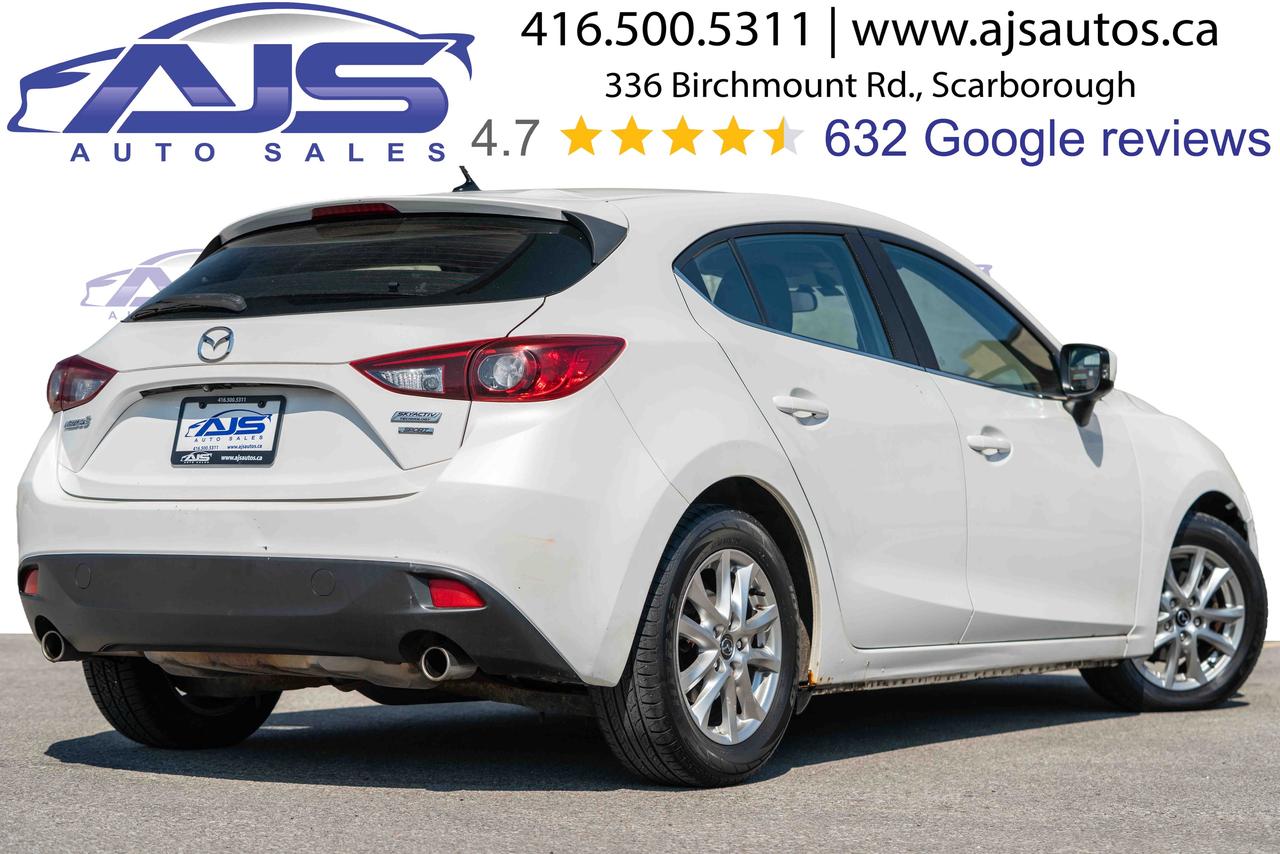 2014 Mazda MAZDA3 i Touring Photo