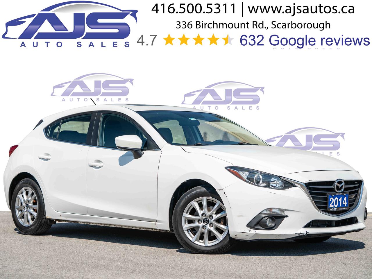 2014 Mazda MAZDA3 i Touring Photo2