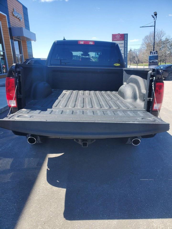 2021 RAM 1500 Classic SLT 4x4 Quad Cab 6'4" Box Photo