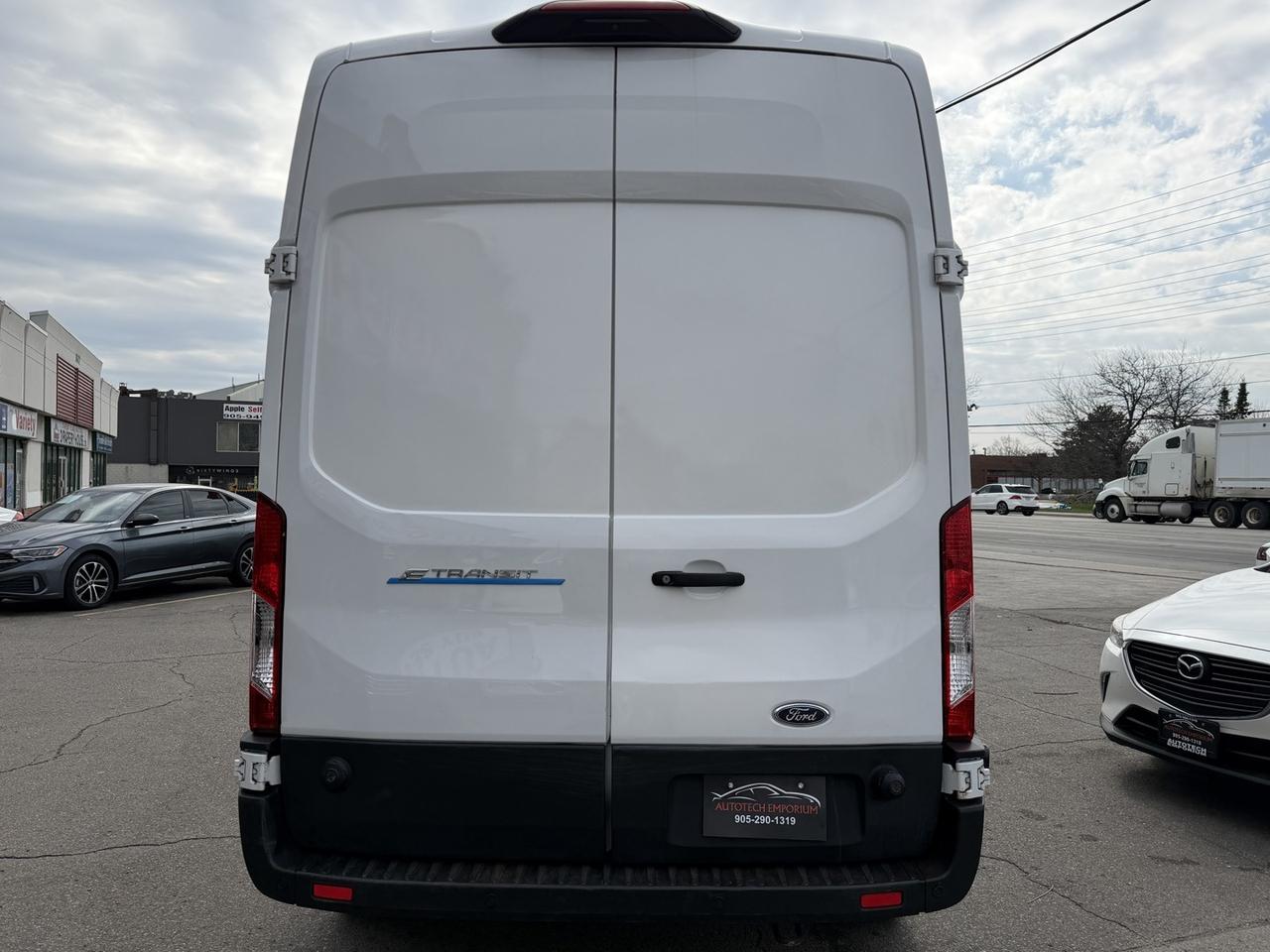 2023 Ford E-Transit Cargo Van T-350 148 HI RF 9500 GVWR RWD Photo