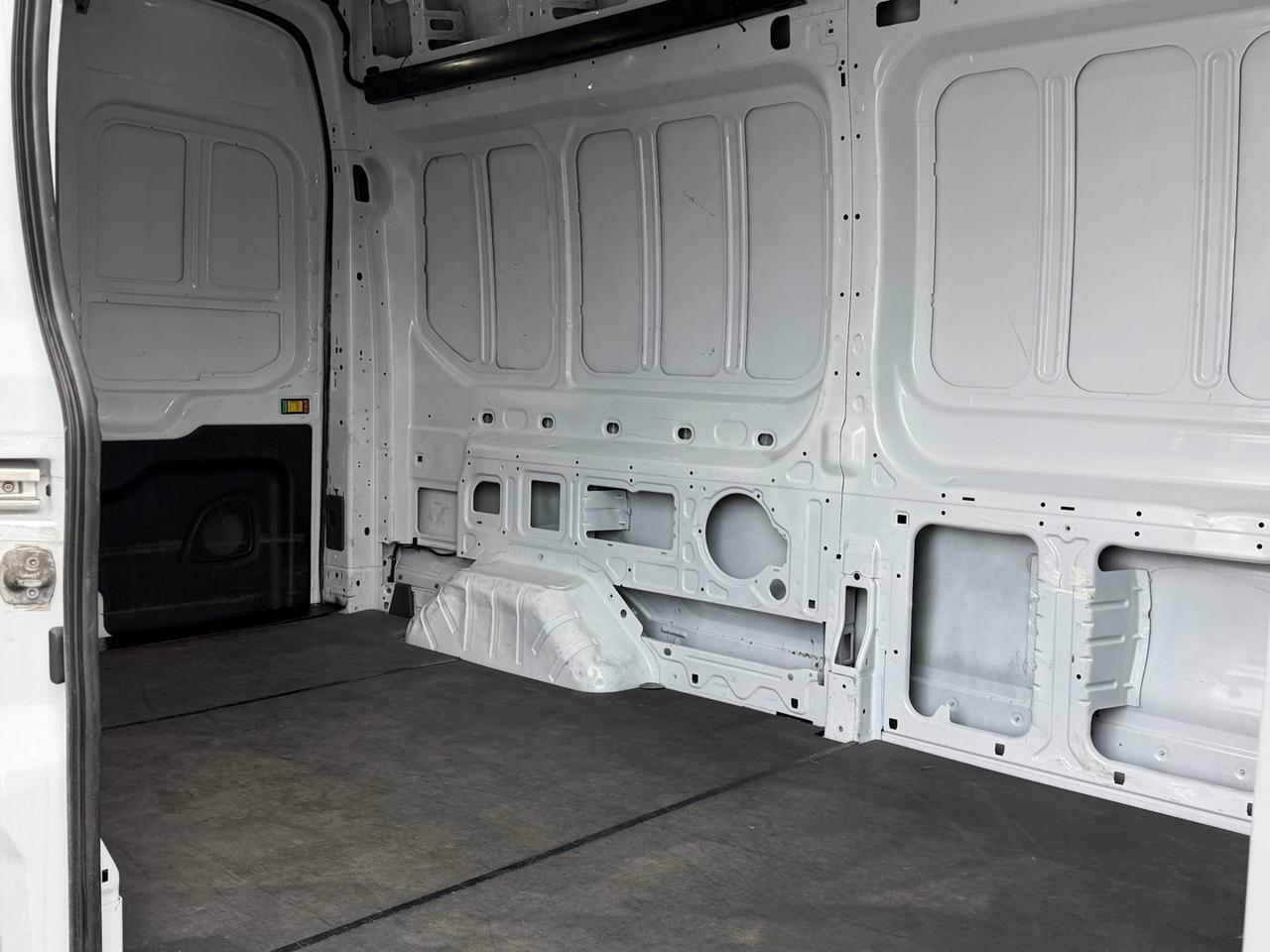 2023 Ford E-Transit Cargo Van T-350 148 HI RF 9500 GVWR RWD Photo