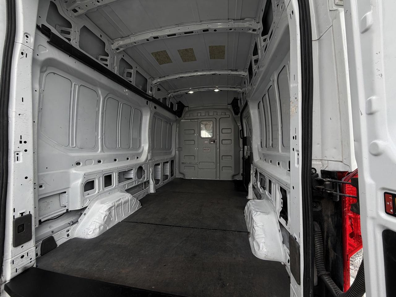 2023 Ford E-Transit Cargo Van T-350 148 HI RF 9500 GVWR RWD Photo