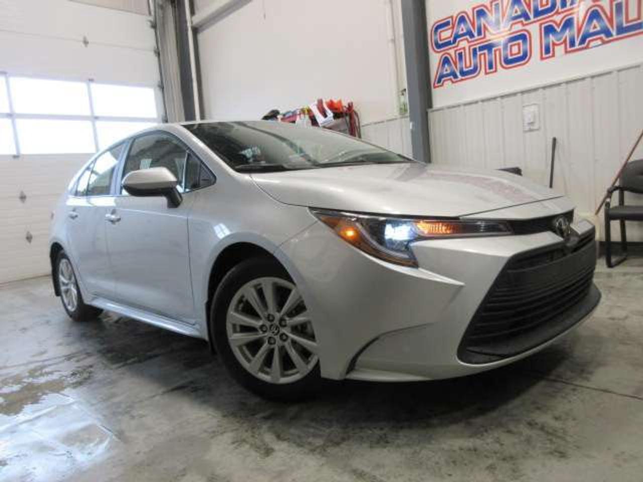 2025 Toyota Corolla LE UPGRADE, ROOF, ALLOYS, HTD. SEATS, APPLE/ANDROI Photo