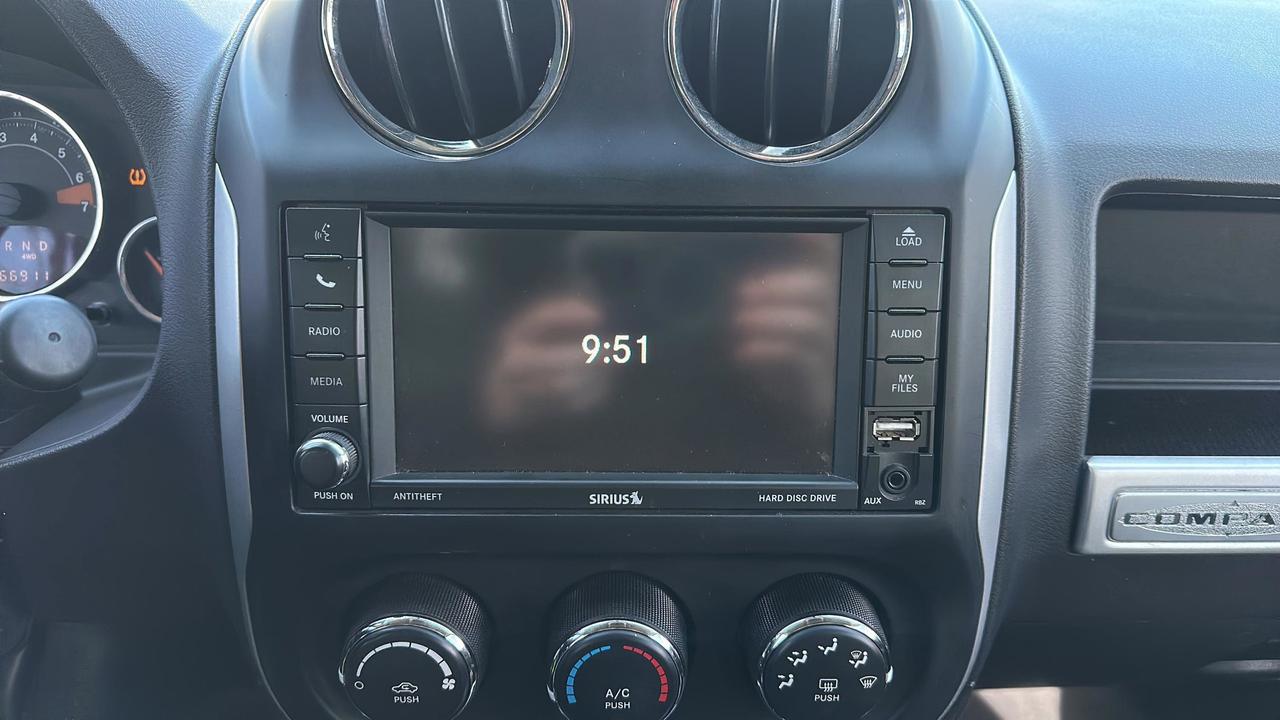 2016 Jeep Compass 4WD 4dr High Altitude Photo
